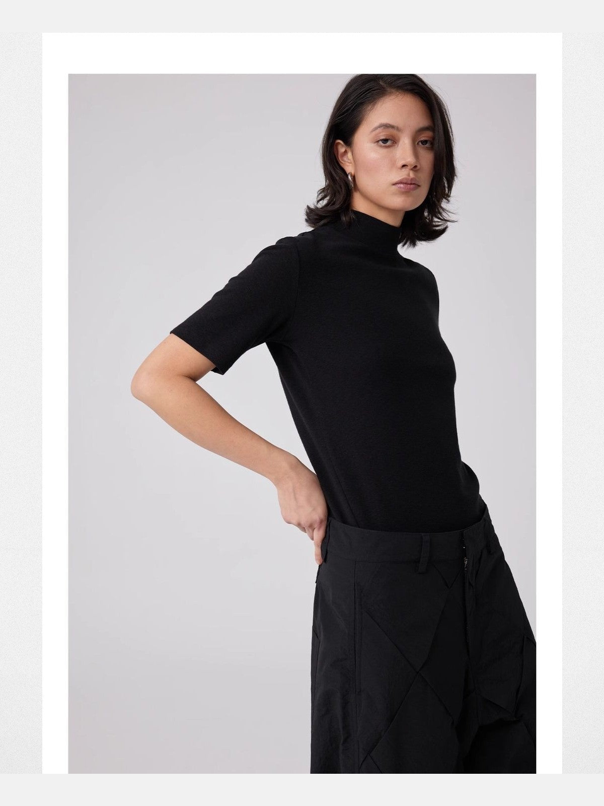 Simple Project Slub Knit Mock Neck Top in Black - On Model