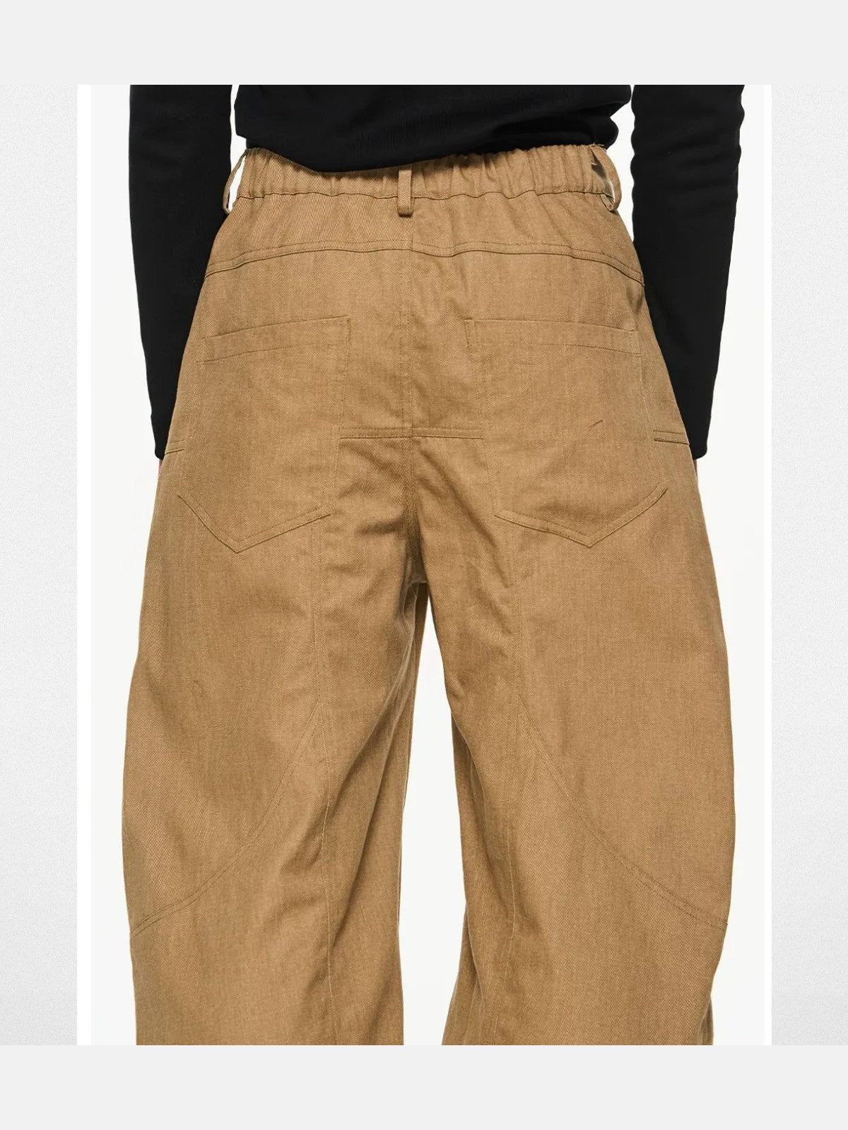 BLINDNOPLAN Irregular Pleated 3D Cut Cargo Pants in Beige - On Model