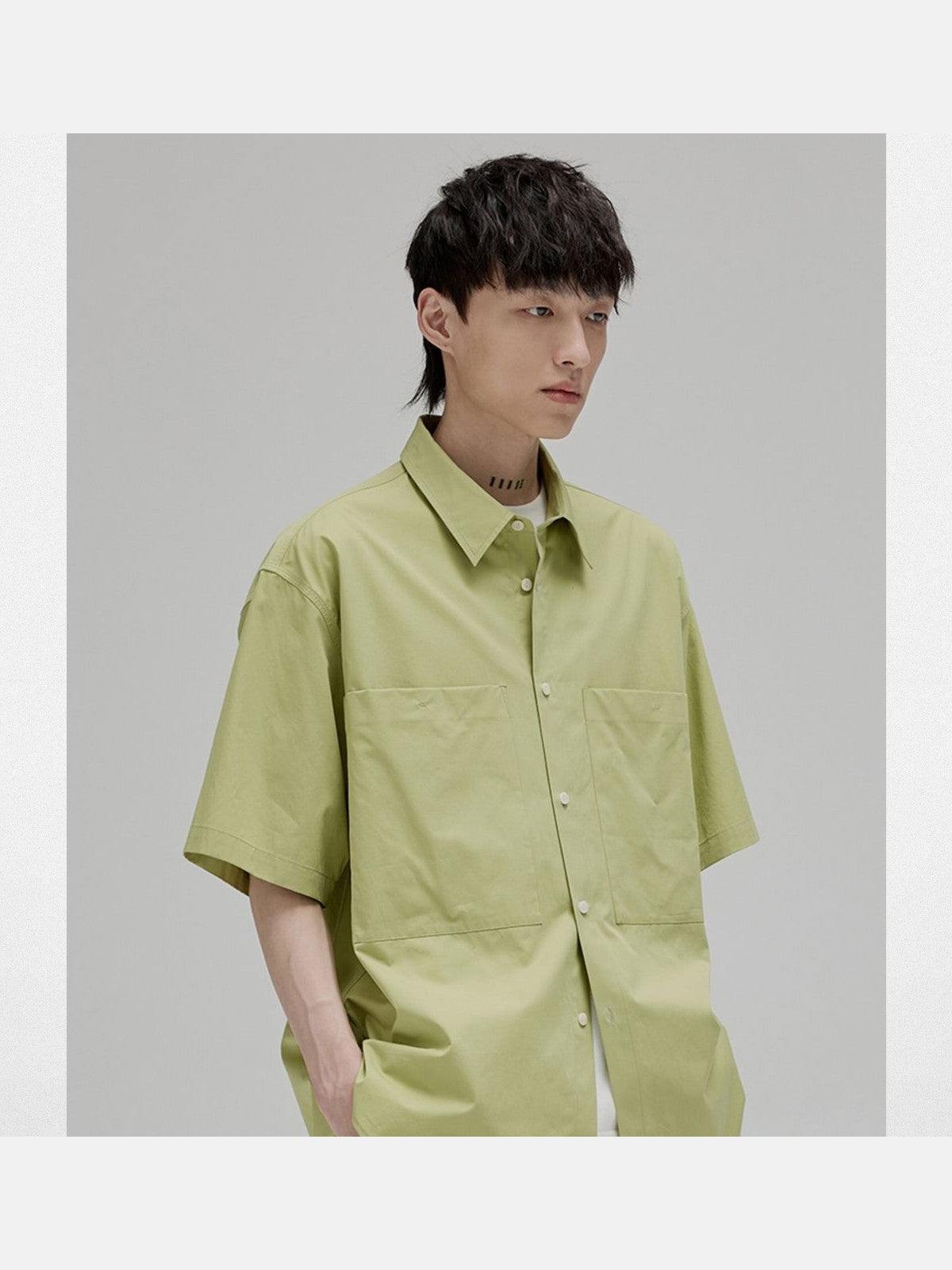 NANS Sand Washed Cotton Curved Hem Shirt in Green - On Model