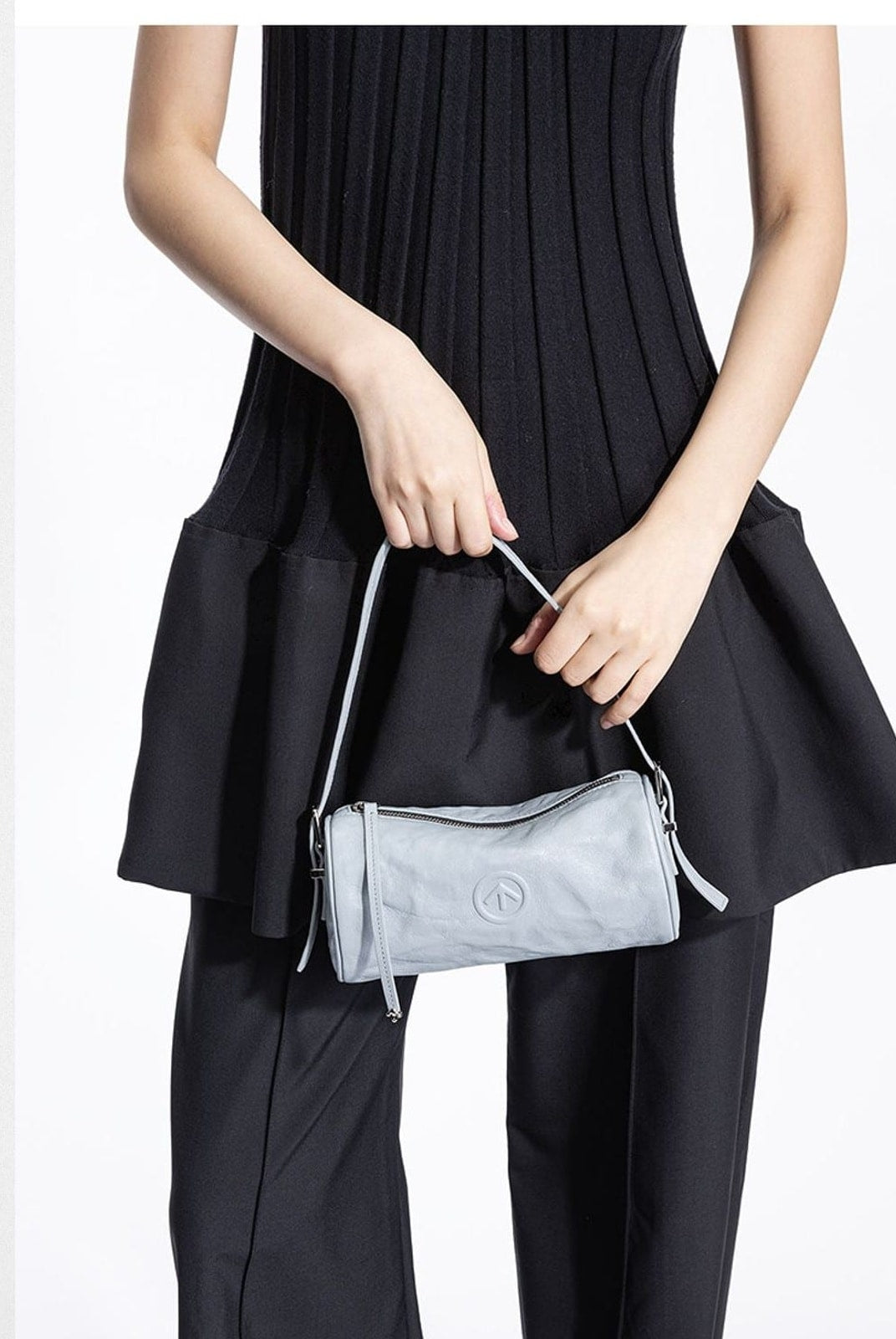 Grotto Pleated Leather Cylinder Bag in Sky Blue - On Female Model