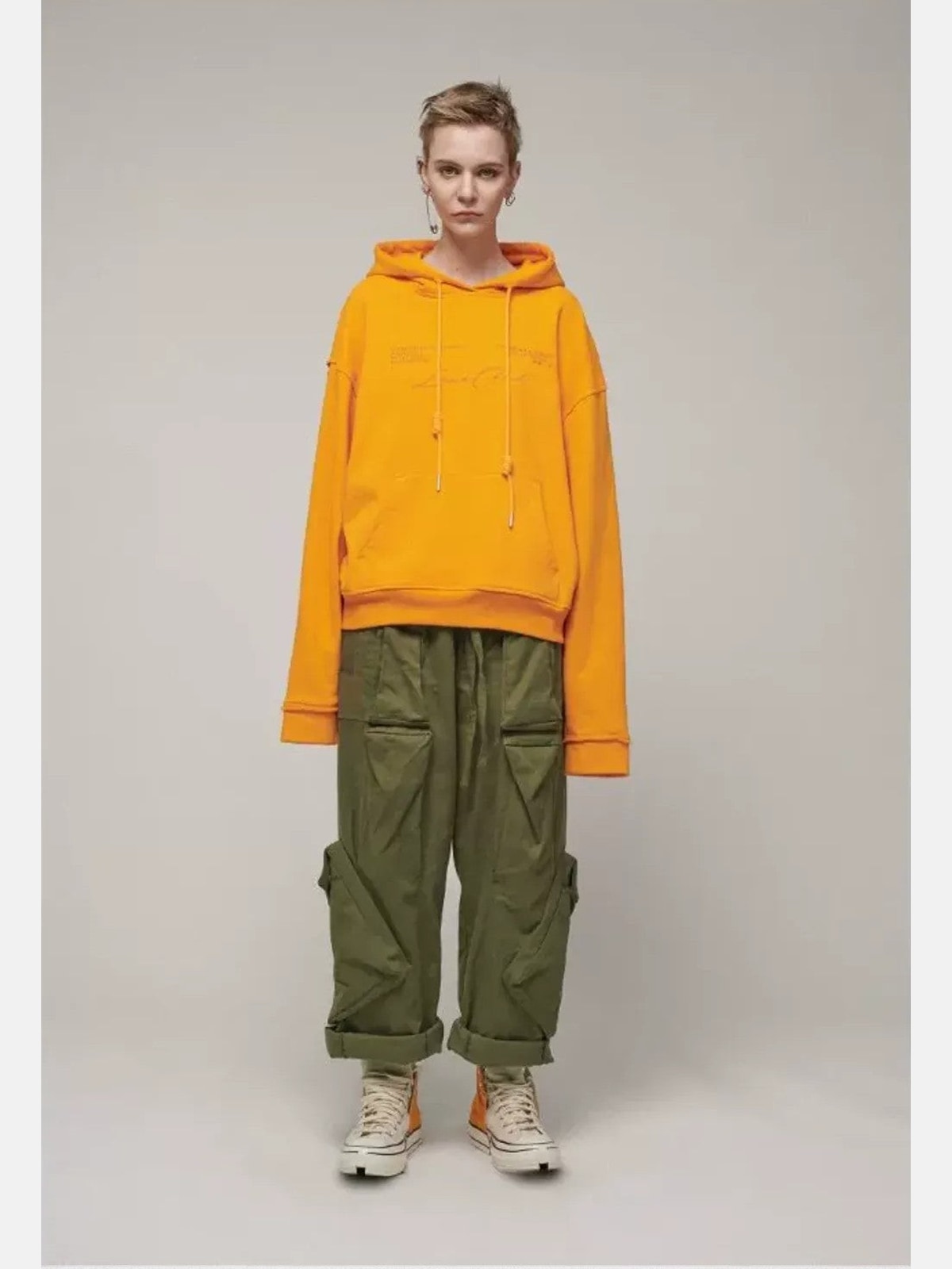 LOSTCTRL Embroidered Raw Edge Cotton Hoodie in Orange - On Model