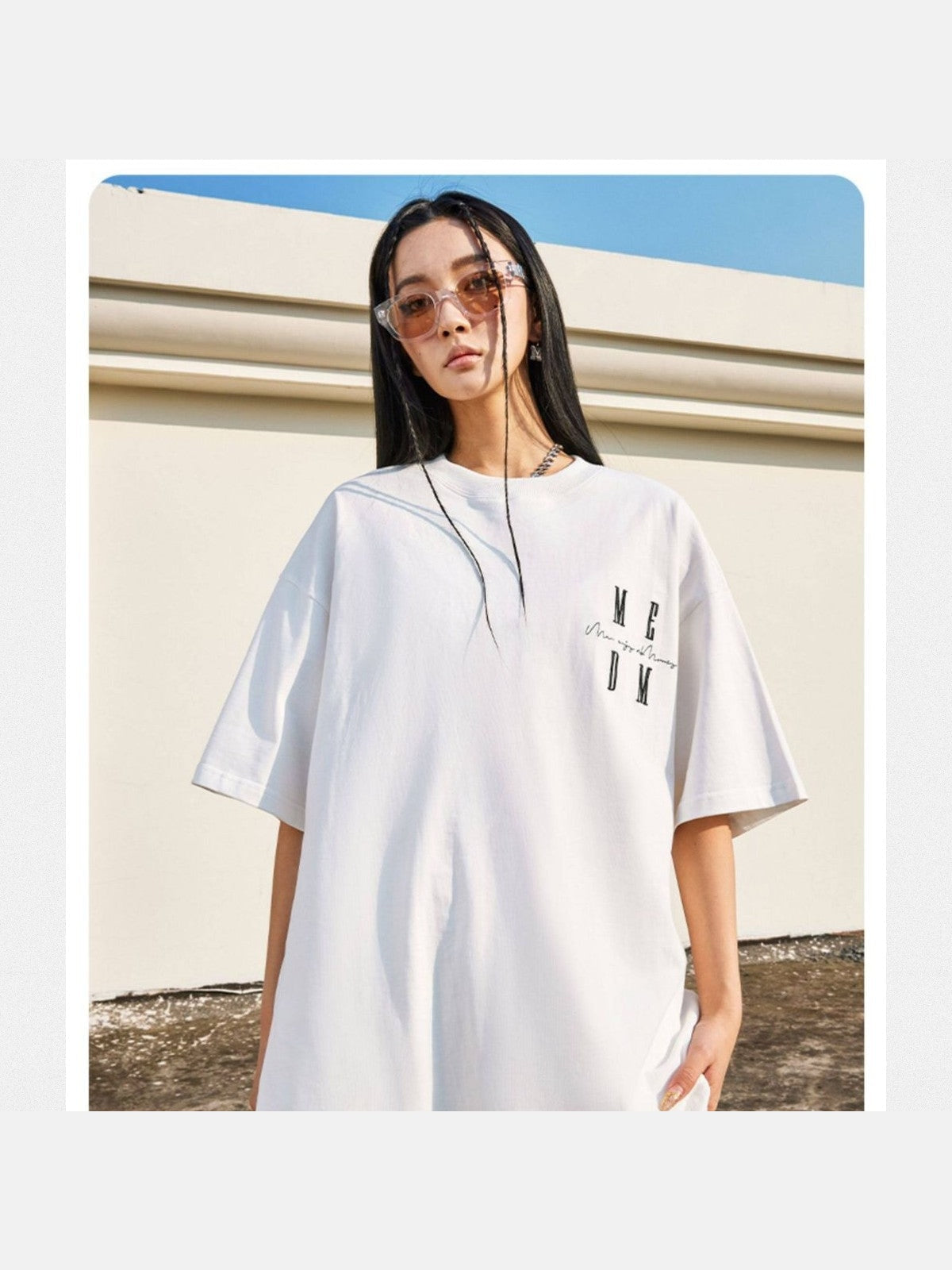 MEDM Oversized Logo Print T Shirt in White - On Female Model