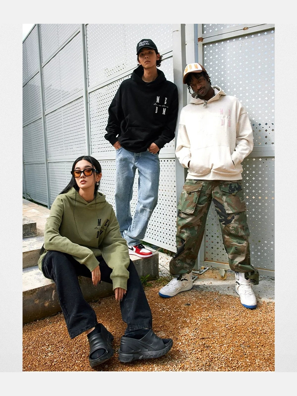 MEDM Embroidered Logo Hoodie in Black - On Mixed Models