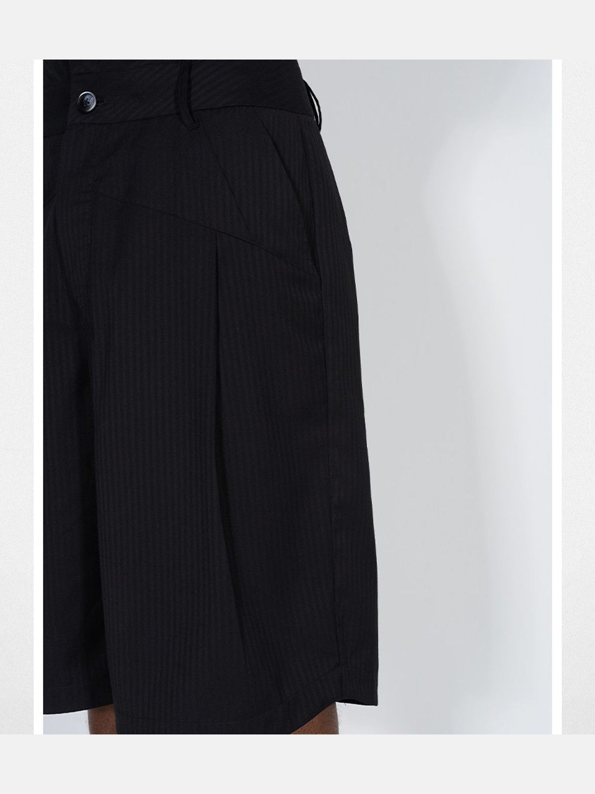 BLINDNOPLAN Dislocated Stripe Tailored Shorts in Black - On Model