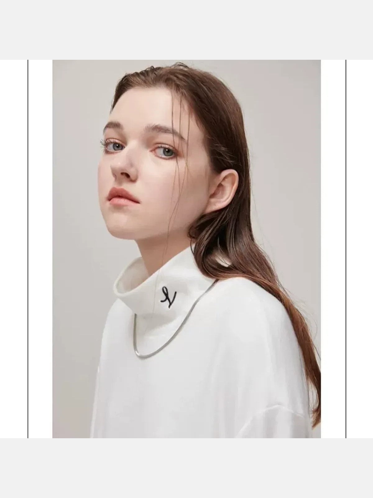 LOSTCTRL Embroidered Mock Neck Top in White - On Model