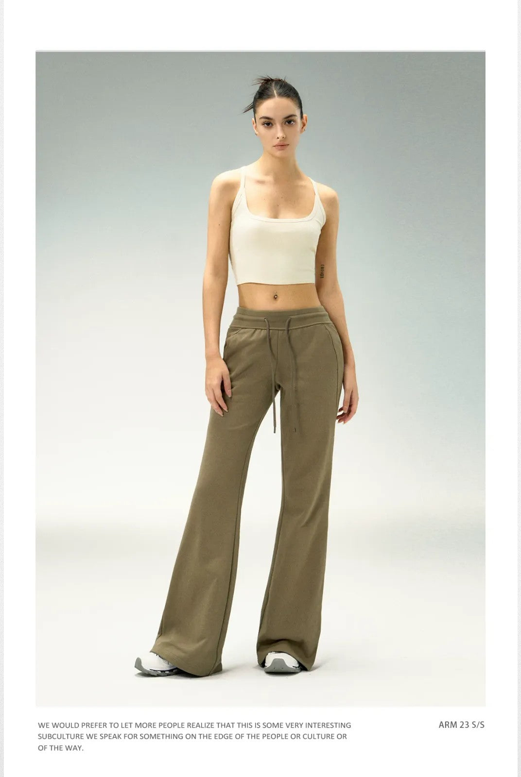 Ariseism Low Rise Micro Flare Sweatpants in Olive - On Model