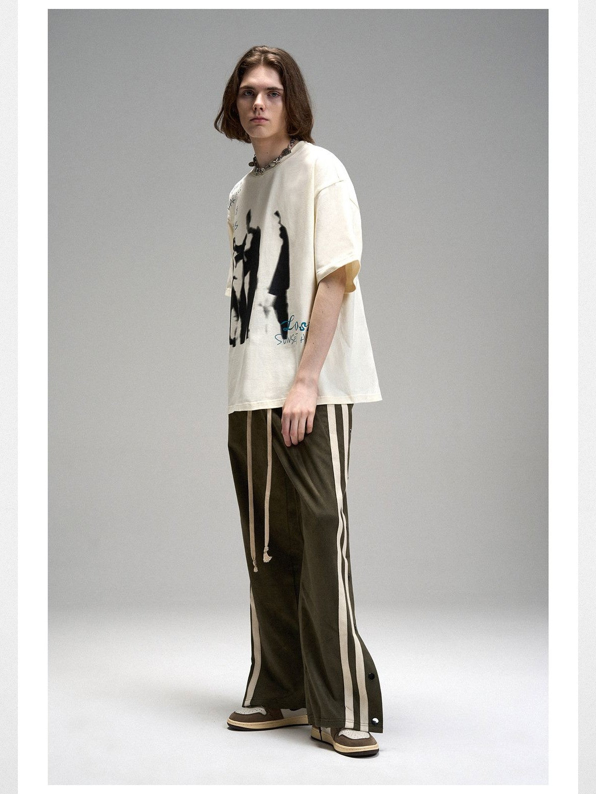 LOSTCTRL Mohe Ballroom Washed Graphic Tee in White - On Male Model