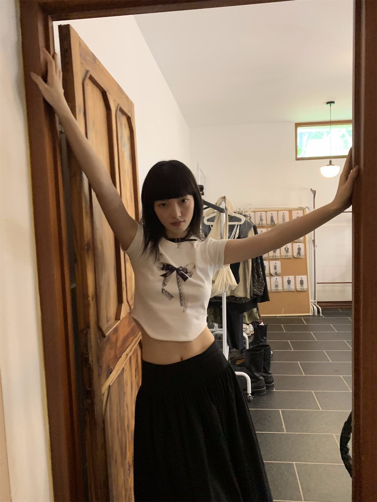 NeverSeez Lace Bow Graphic Baby Tee in White - On Model