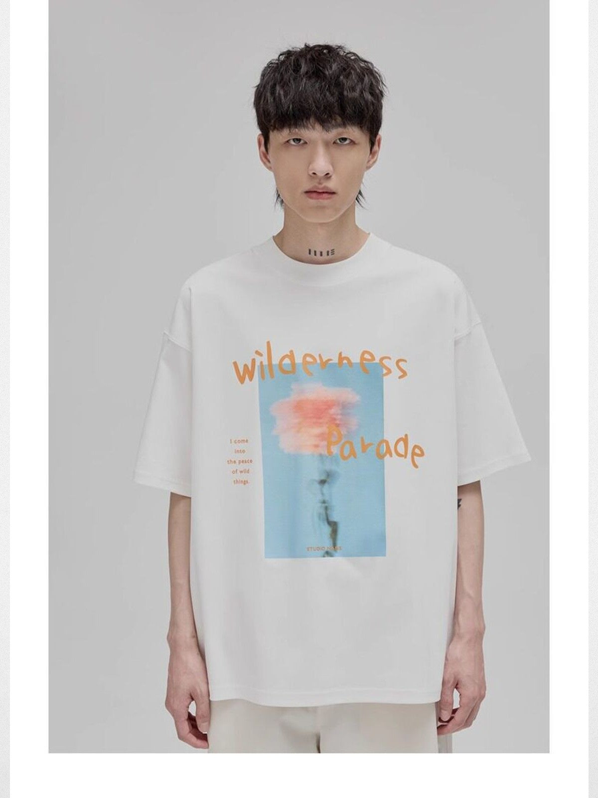 NANS Wilderness Parade Mercerized Tee in Orange - On Model