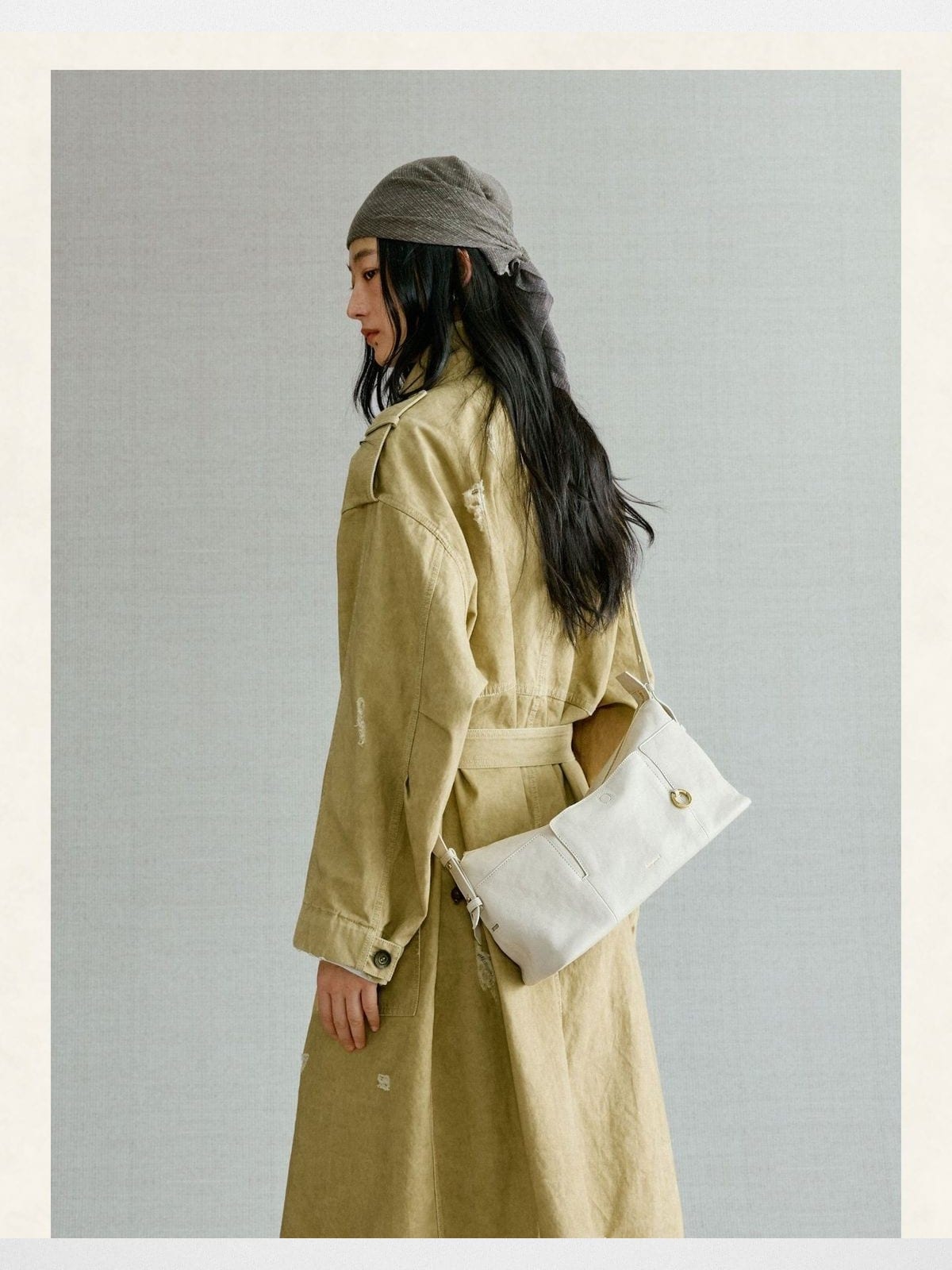 Songmont Vegetable Tanned Lambskin Pillow Hobo in Cream - On Female Model