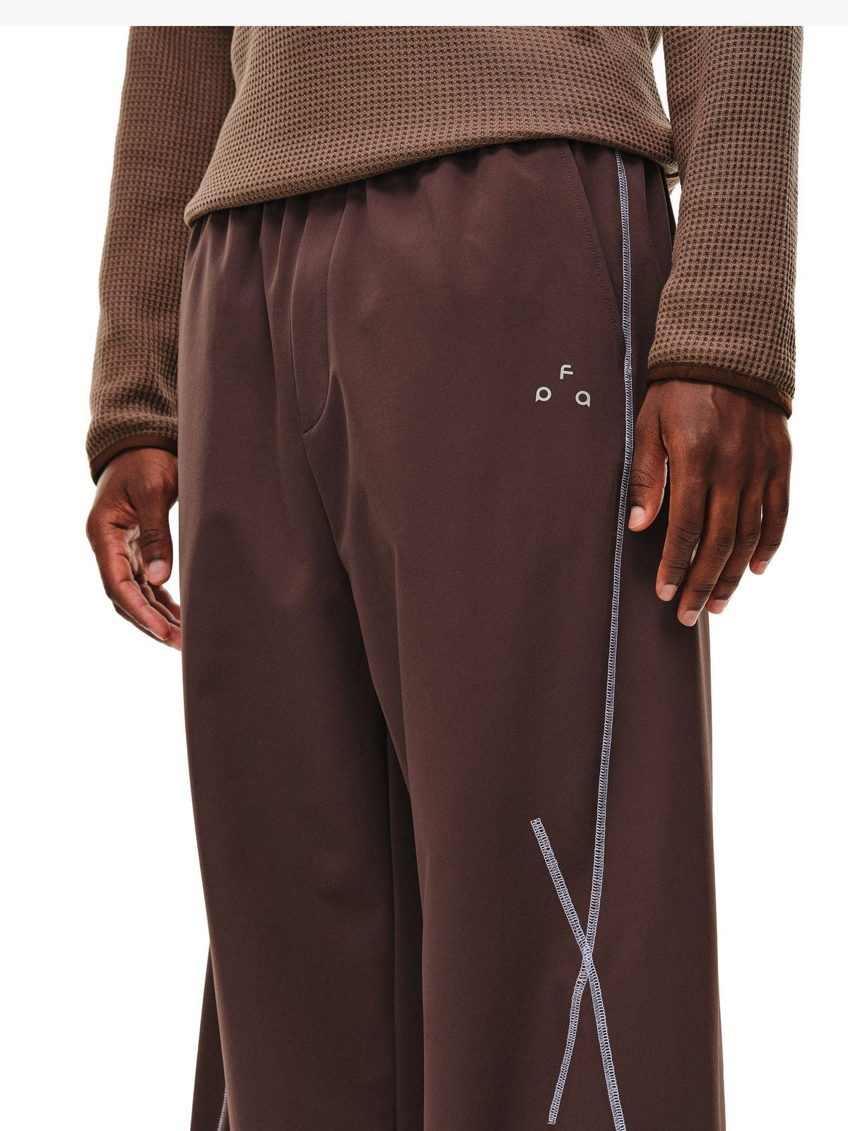 FPA Curved Leg Nylon Trousers in Brown - On Model