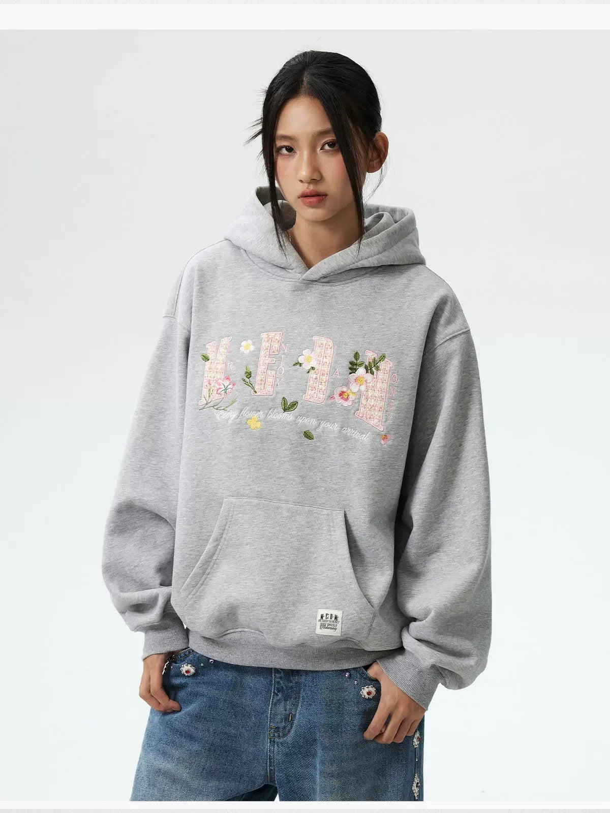 MEDM Floral Patch Fleece Hoodie in Gray - On Female Model