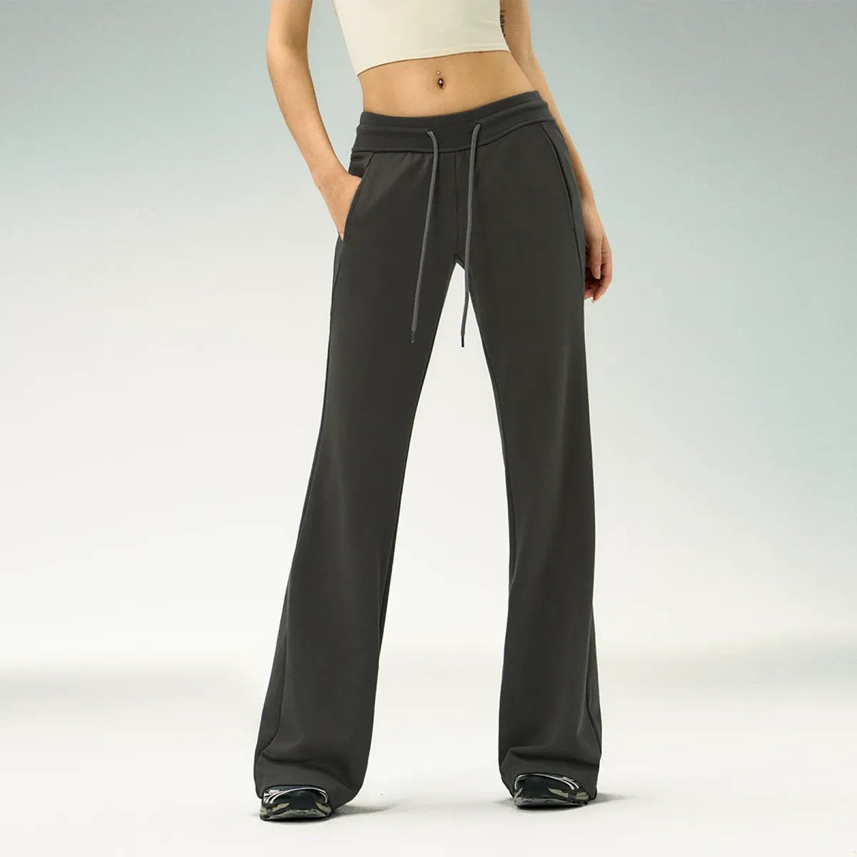 Ariseism Low Rise Micro Flare Sweatpants in Charcoal - On Model