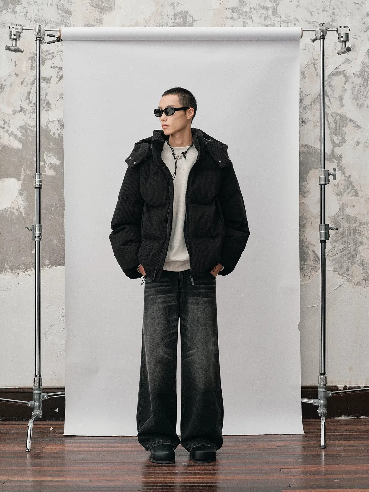 NANS Corduroy Texture Down Puffer Jacket in Black - On Male Model