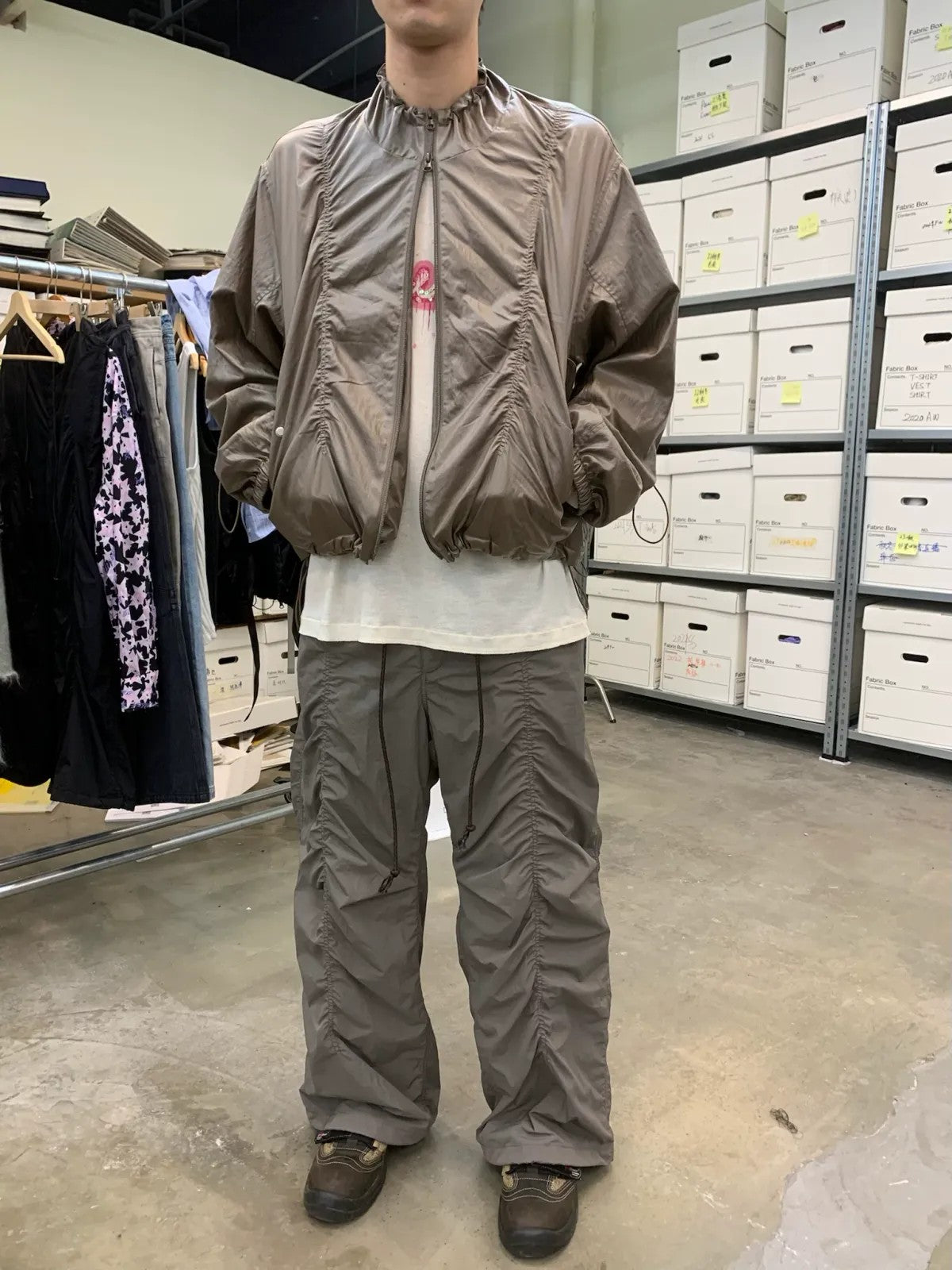 NeverSeez Glossy Ruched Tencel Windbreaker in Coffee - On Male Model