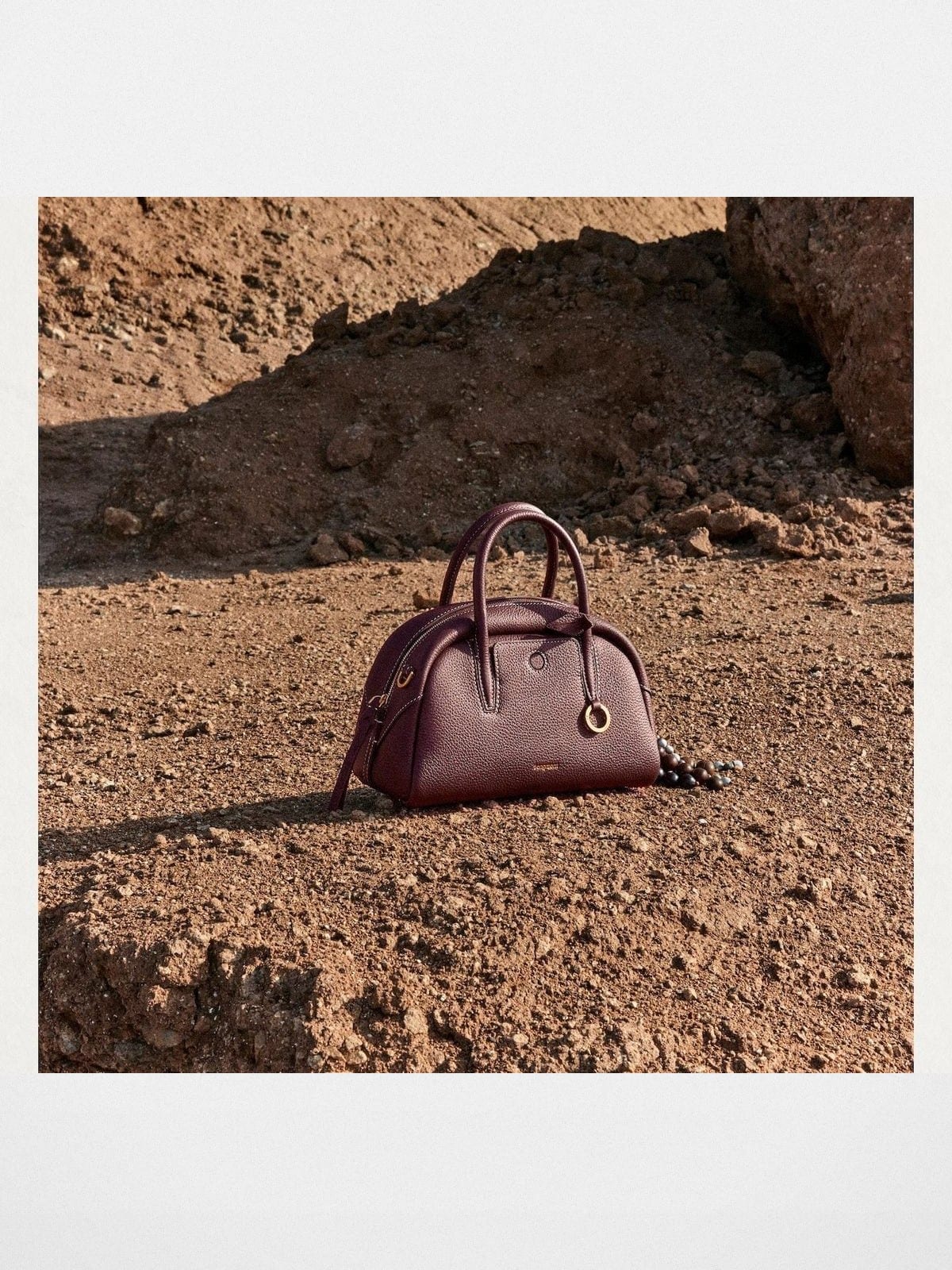 Songmont Leather Mini Bowling Bag in Burgundy - Lifestyle