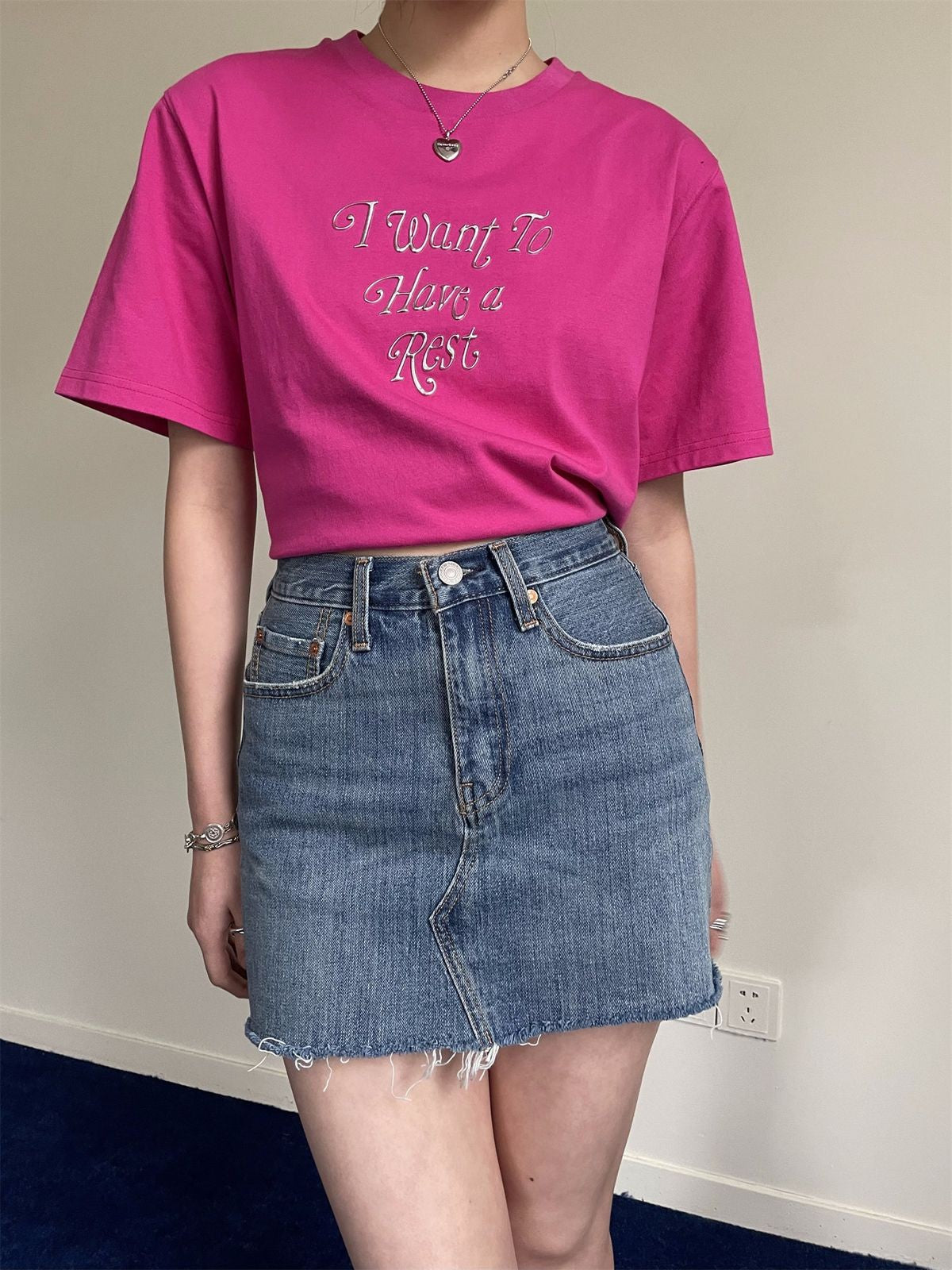 NeverSeez Embossed Script Cotton T Shirt in Hot Pink - On Female Model