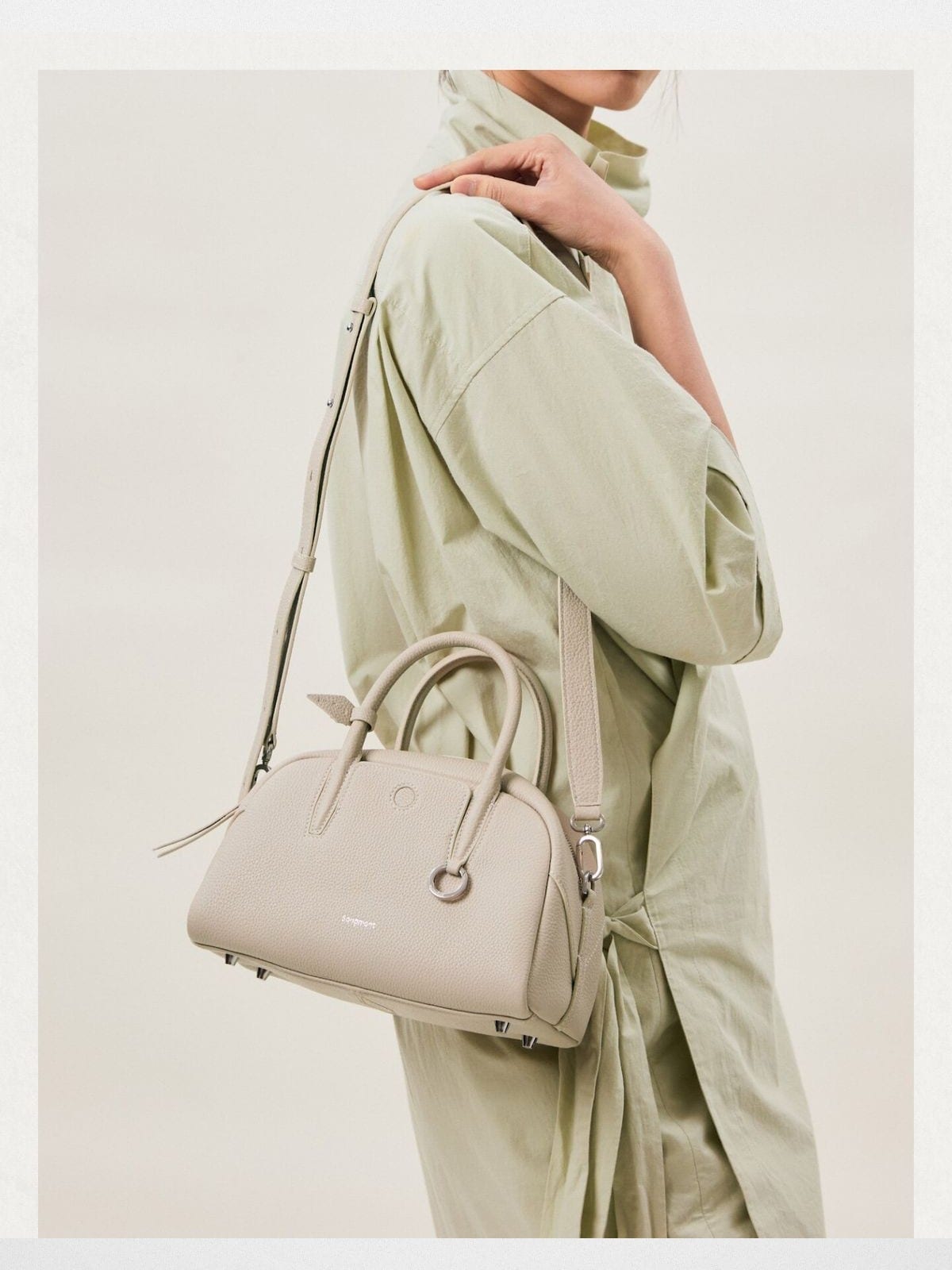 Songmont Leather Mini Bowling Bag in Cream - On Model