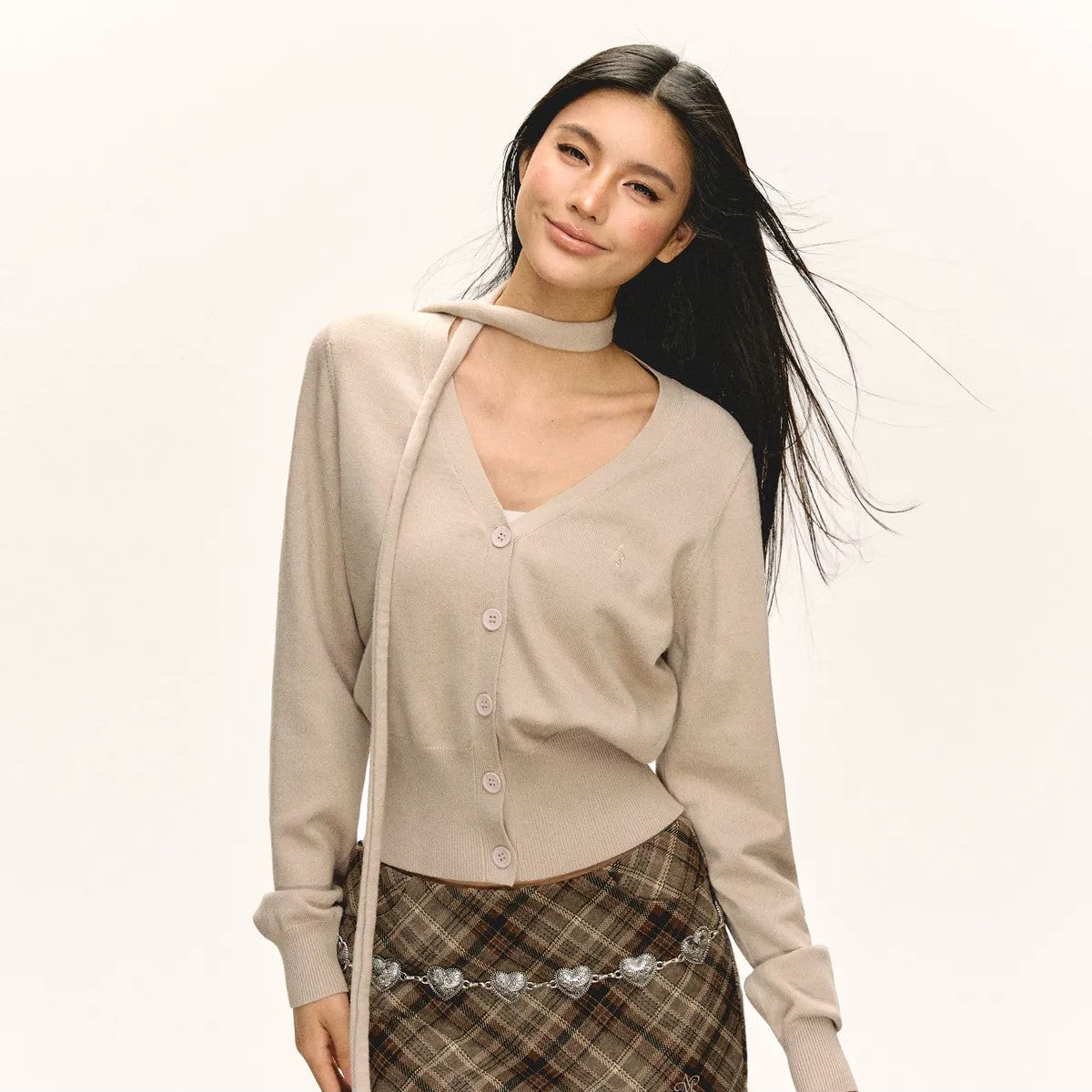 ARISEISM Cropped V Neck Cardigan Neck Tie in Beige - On Model