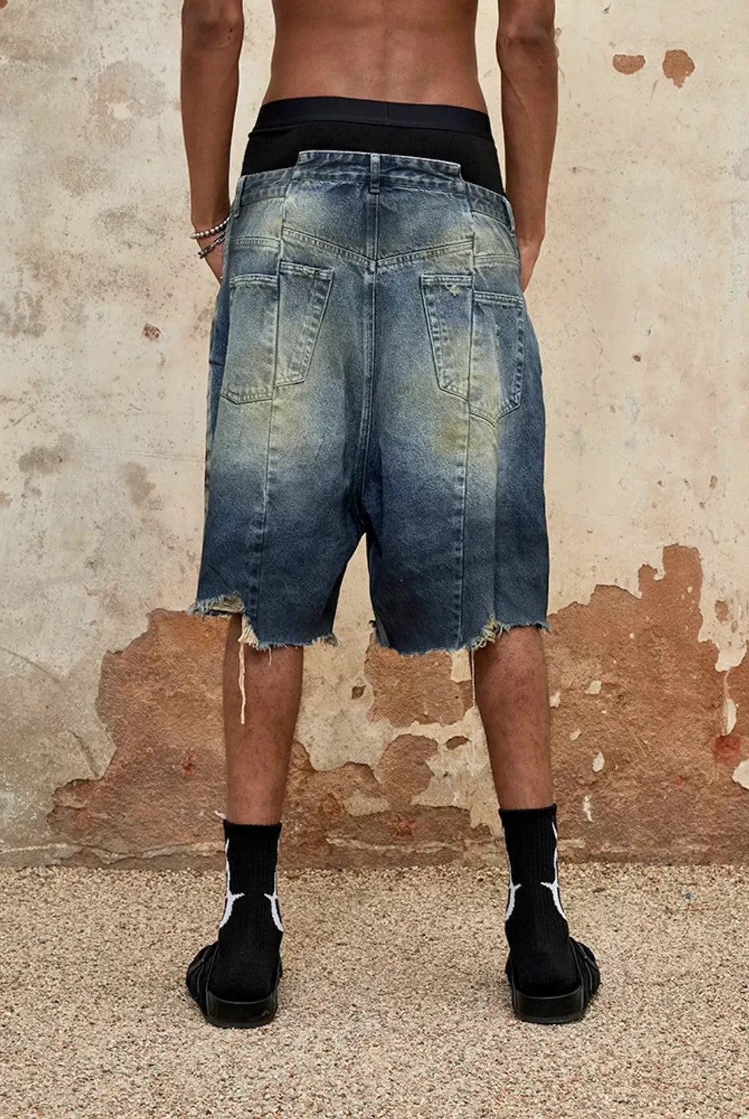 TRIANGLE PROJECT Deconstructed Distressed Denim Shorts in Blue - On Model