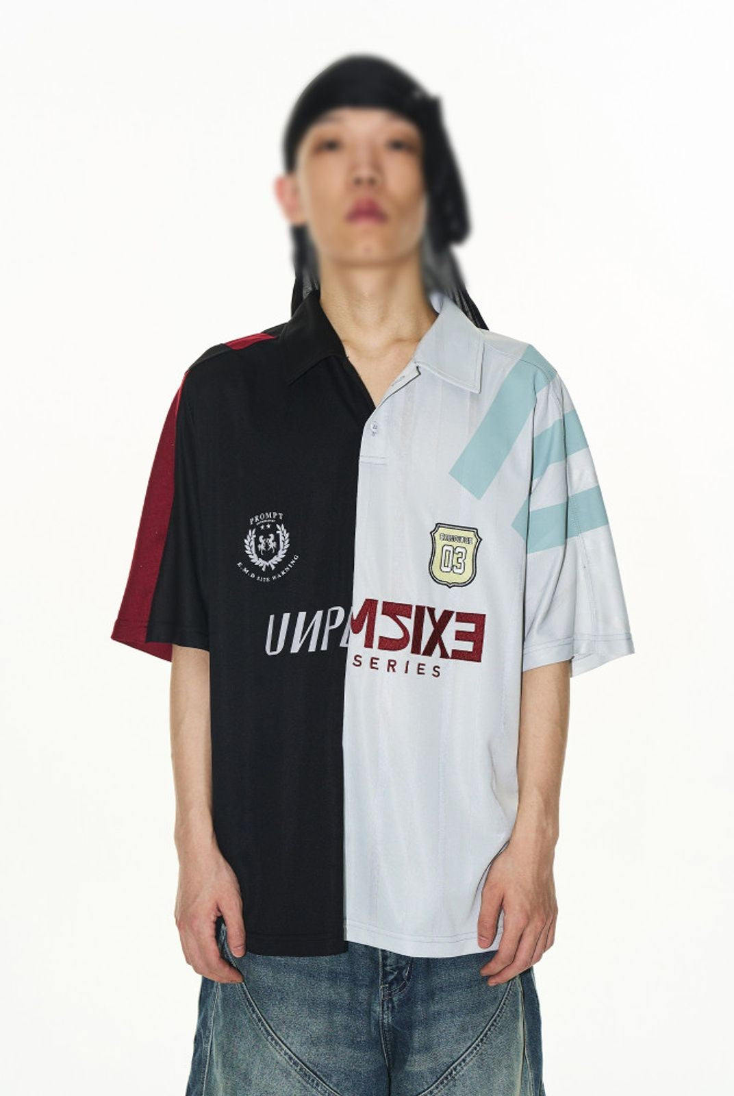 BLINDNOPLAN Split Panel Graphic Polo Shirt in Black - On Model