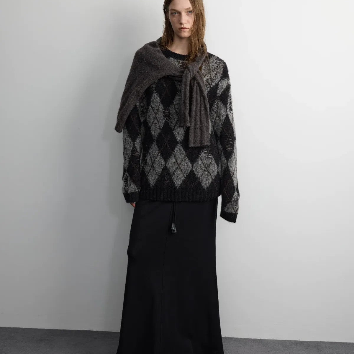 RandomPiece Distressed Argyle Alpaca Blend Sweater in Black - On Model