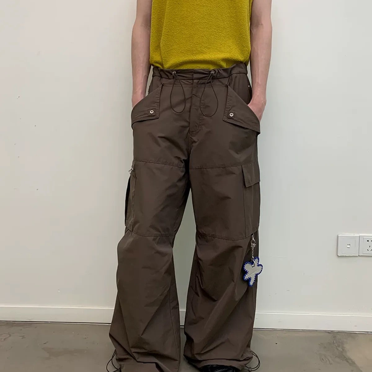 NeverSeez Accordion Pocket Wide Leg Cargo Pants in Brown - On Model