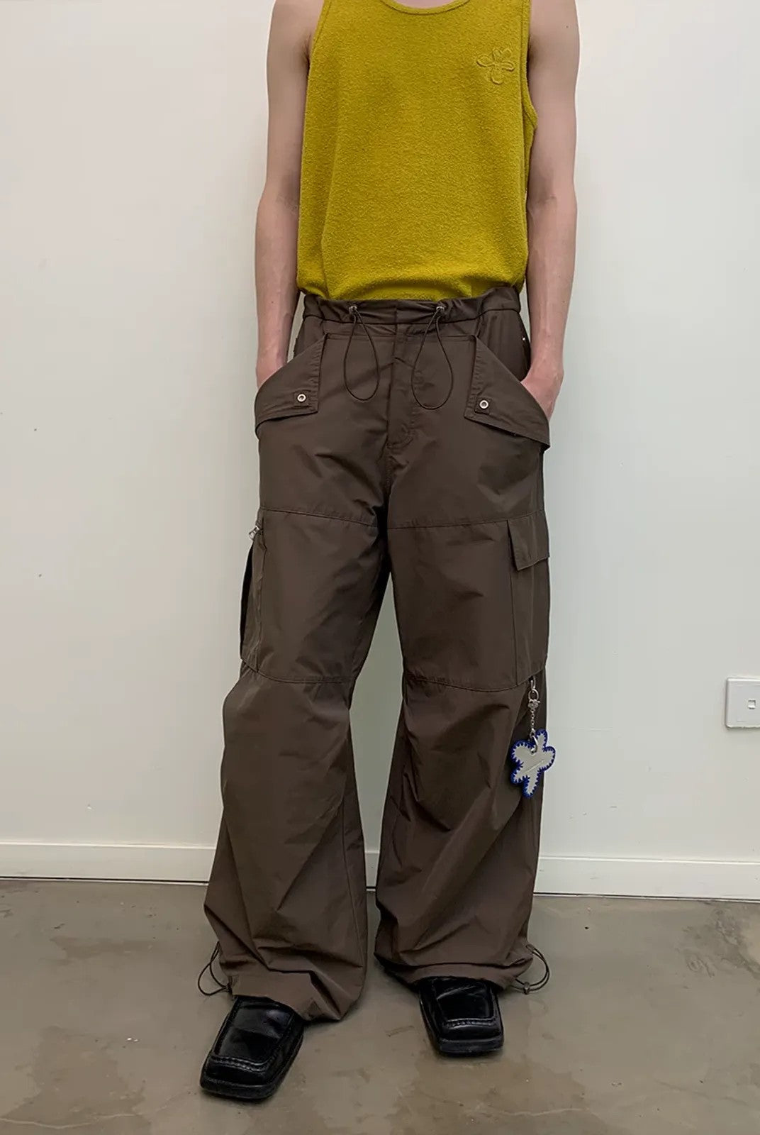 NeverSeez Accordion Pocket Wide Leg Cargo Pants in Brown - On Model