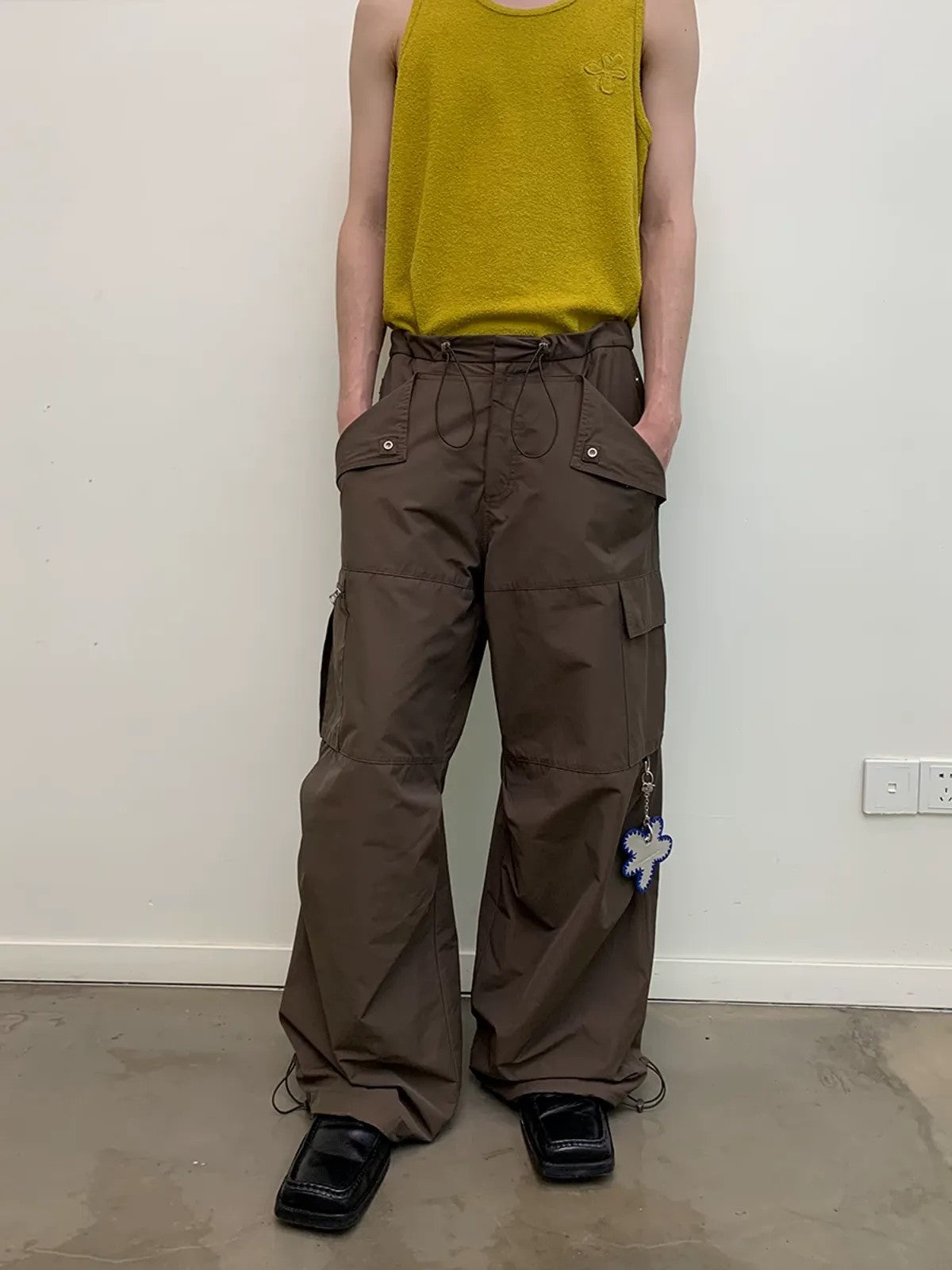 NeverSeez Accordion Pocket Wide Leg Cargo Pants in Brown - On Male Model