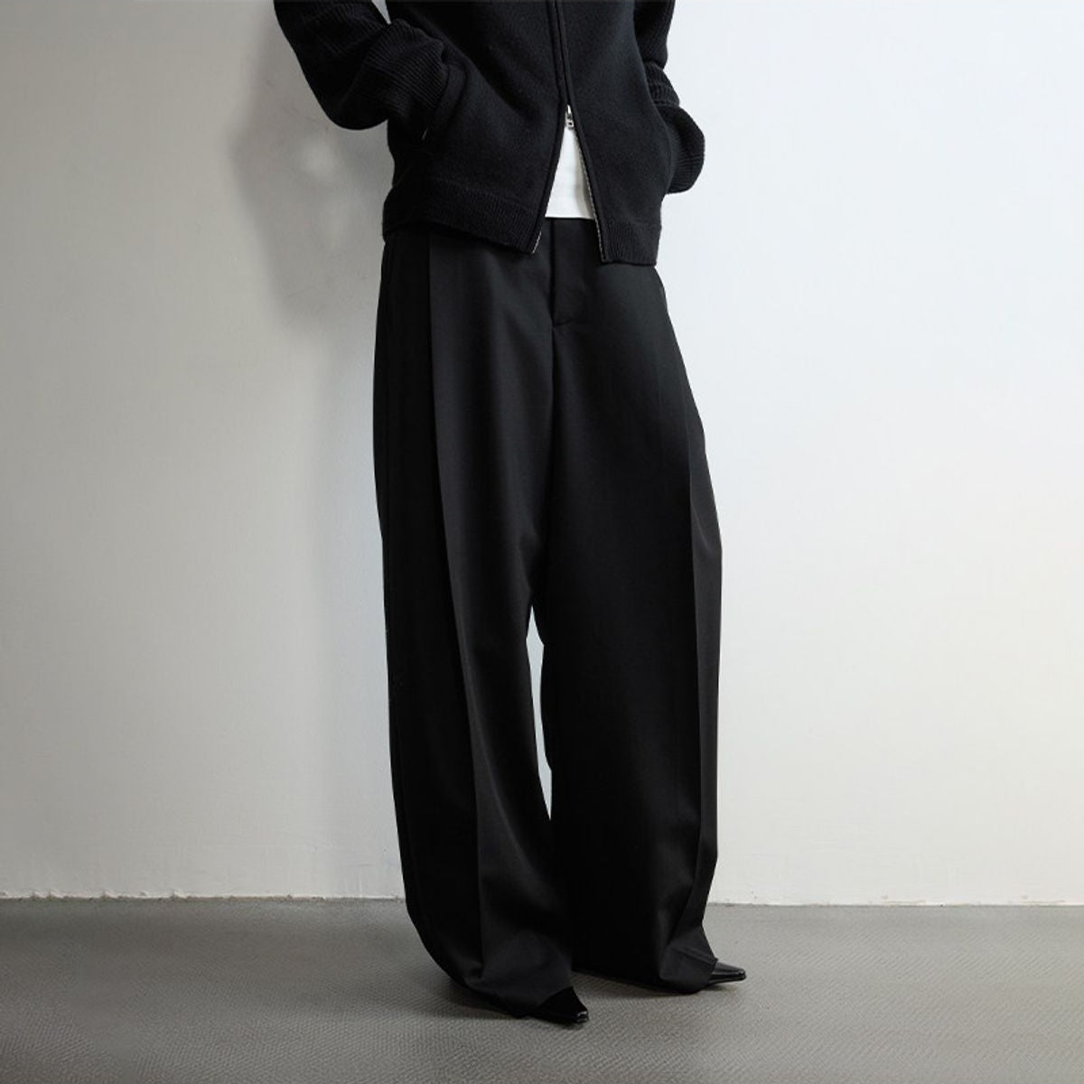 RandomPiece Single Pleat Merino Wool Trousers in Black - On Model