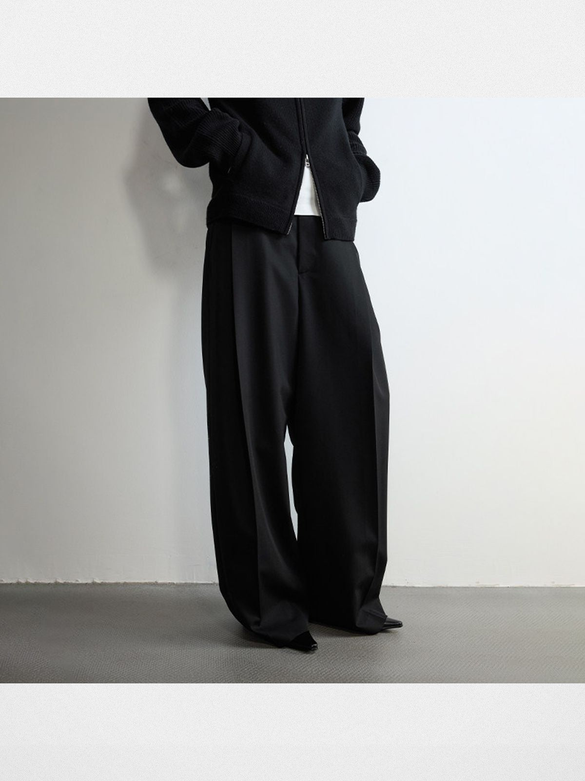 RandomPiece Single Pleat Merino Wool Trousers in Black - On Model