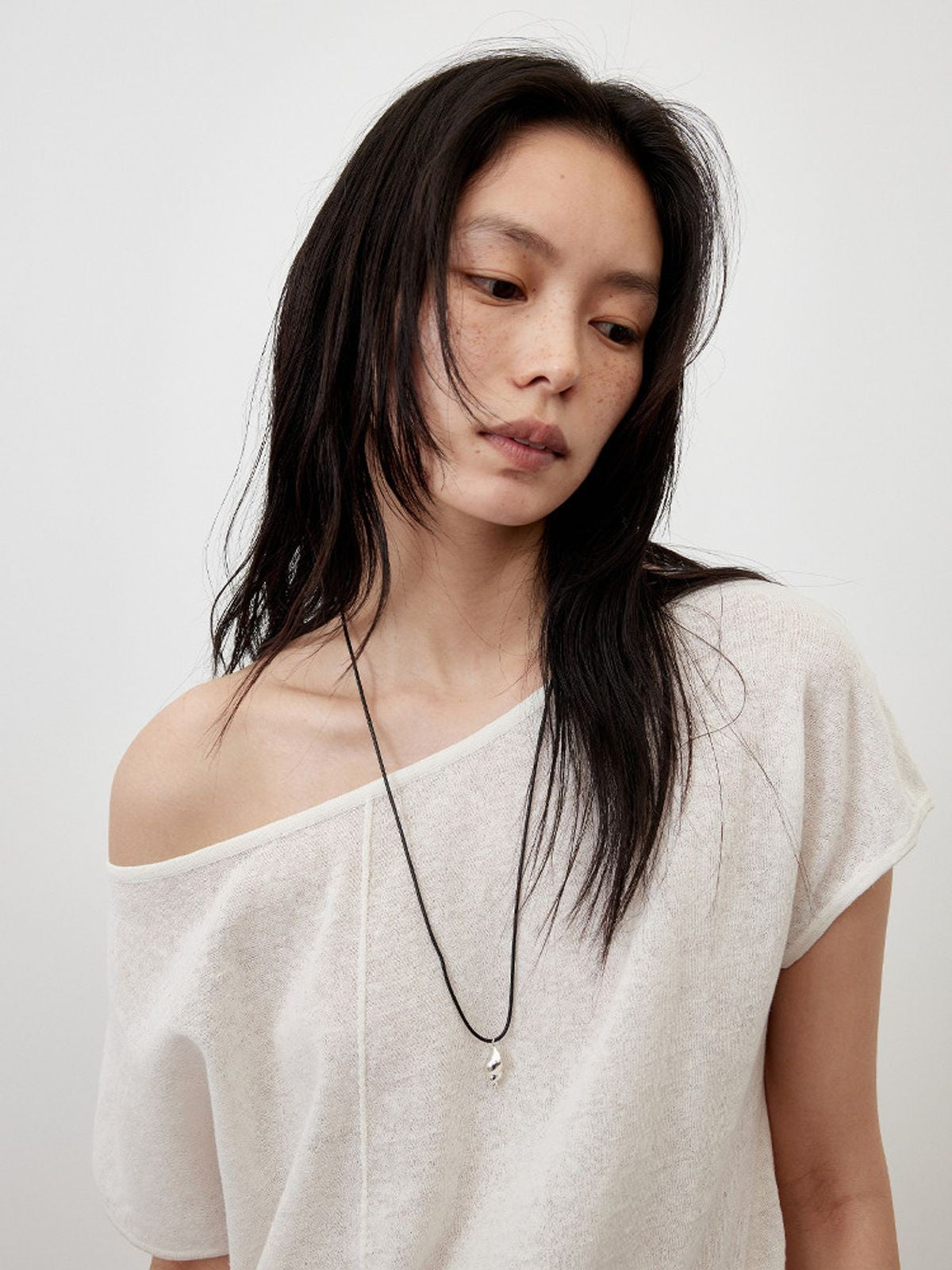 RandomPiece Asymmetric Linen Blend Knit Top in White - On Model