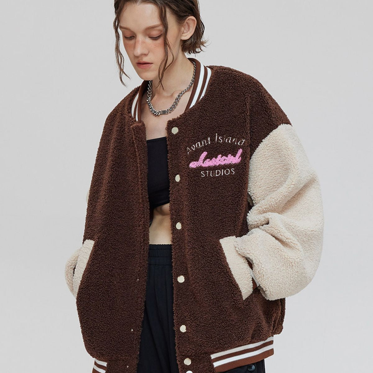 LOSTCTRL Patchwork Sherpa Varsity Jacket in Brown - On Model