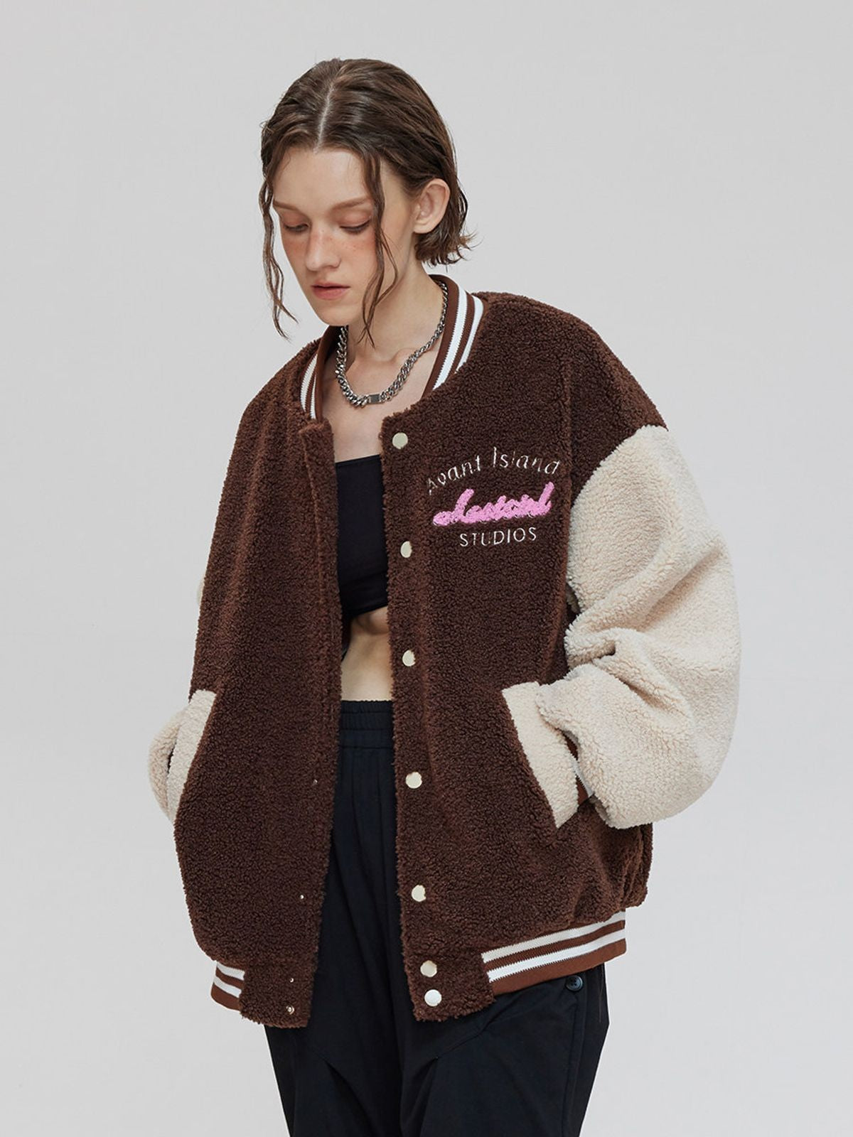 LOSTCTRL Patchwork Sherpa Varsity Jacket in Brown - On Model