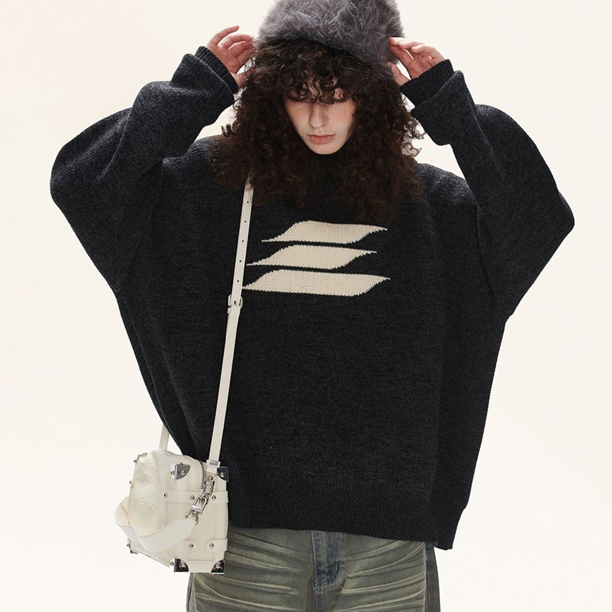 LOSTCTRL Abstract Logo Knit Sweater in Black - On Model