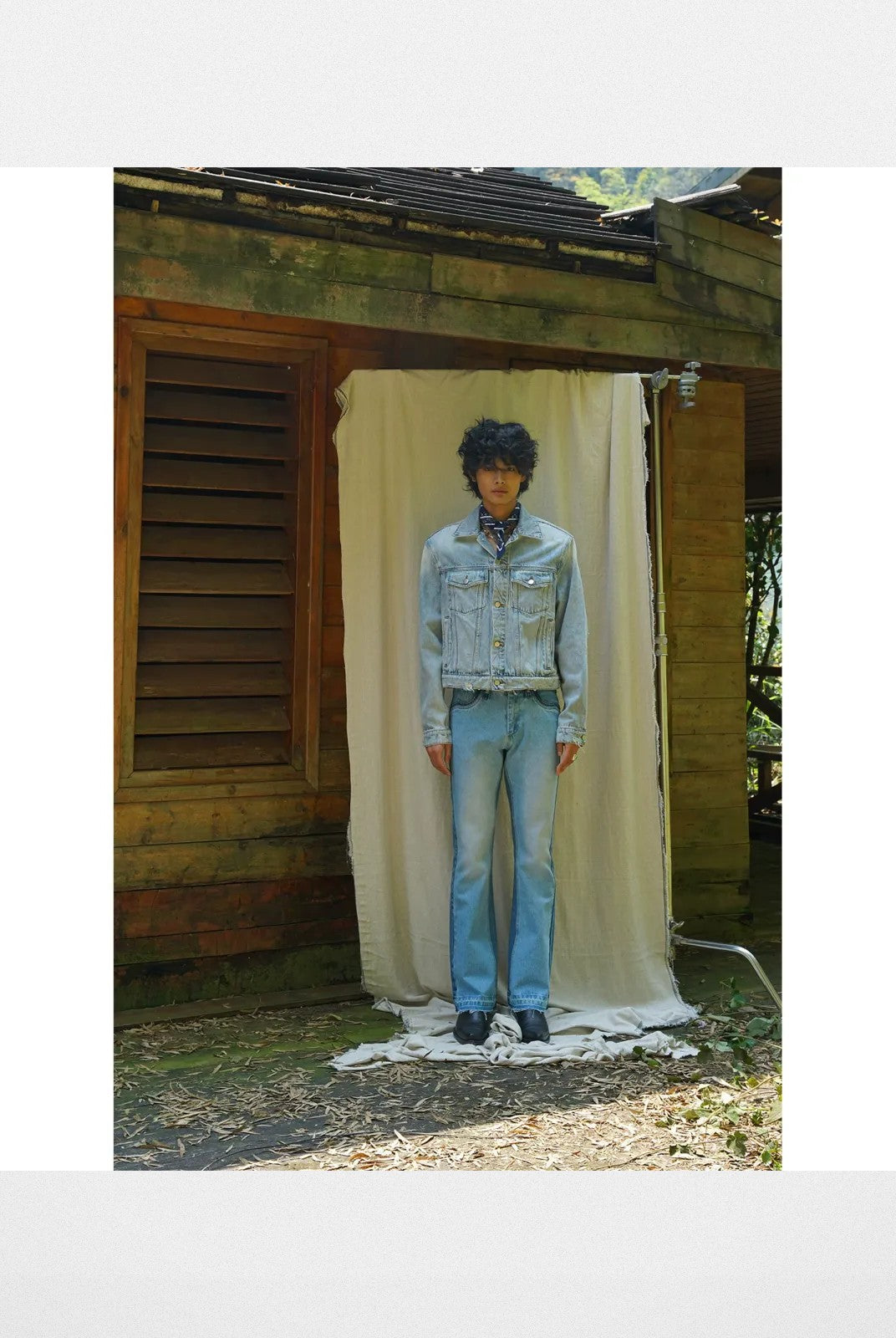 Retro 21 Distressed Denim Jacket with Shoulder Pads in Blue - On Model