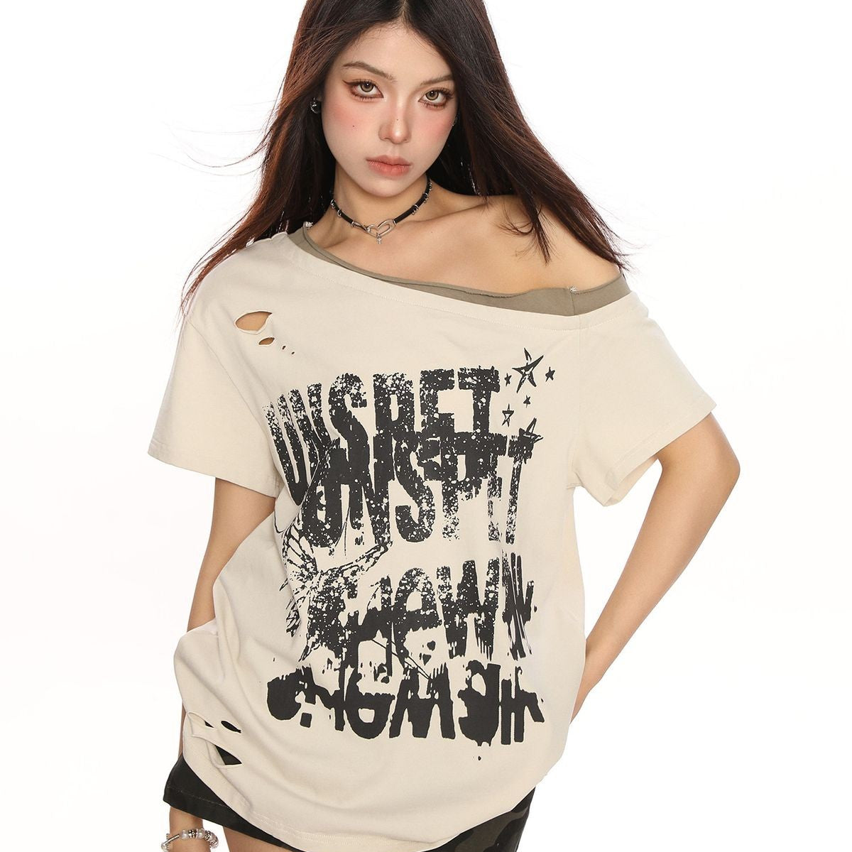 BIGGOLD STUDIO Distressed Graffiti Off Shoulder Tee in Cream - On Model #color_cream