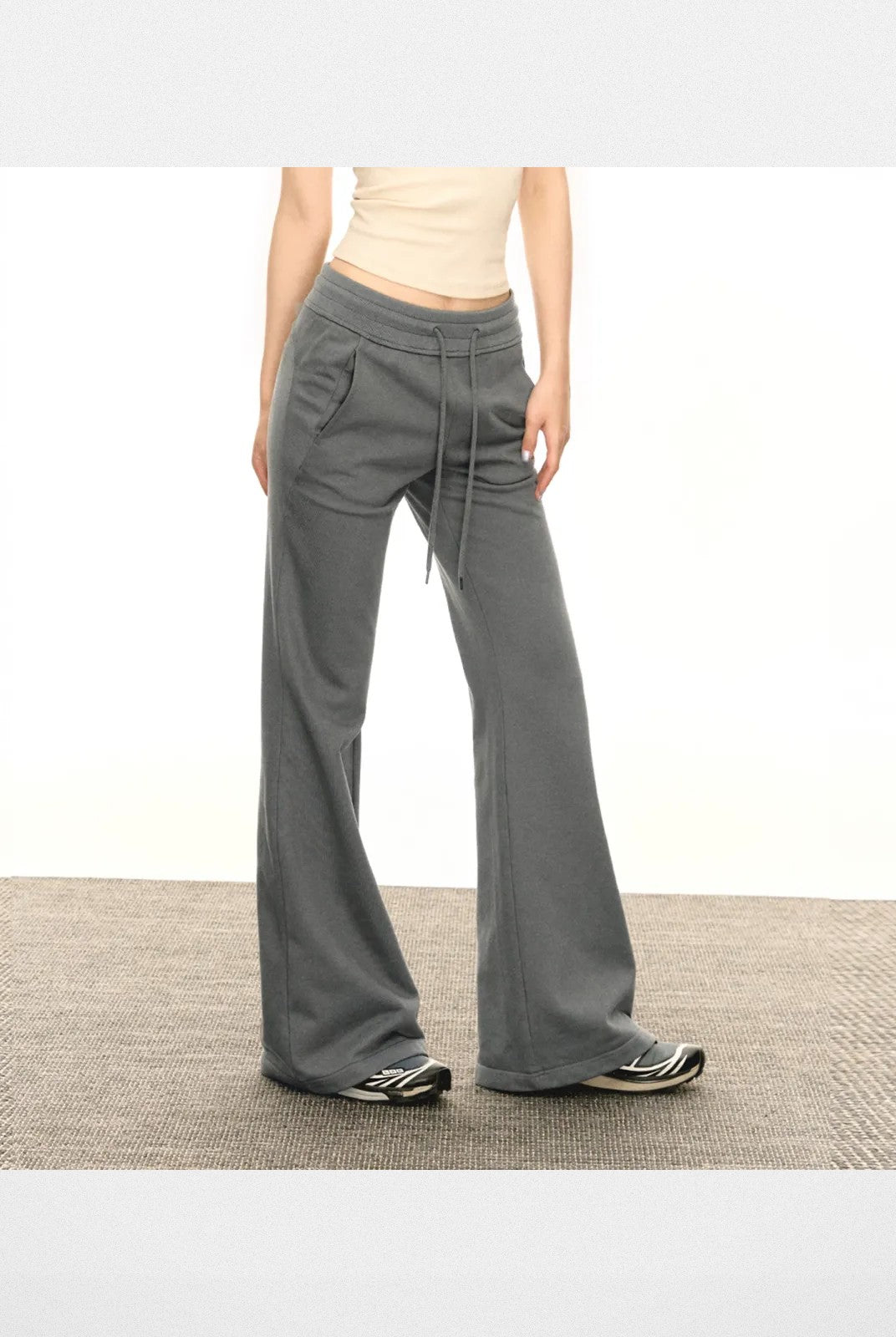 Ariseism Low Rise Micro Flare Sweatpants in Gray - On Model