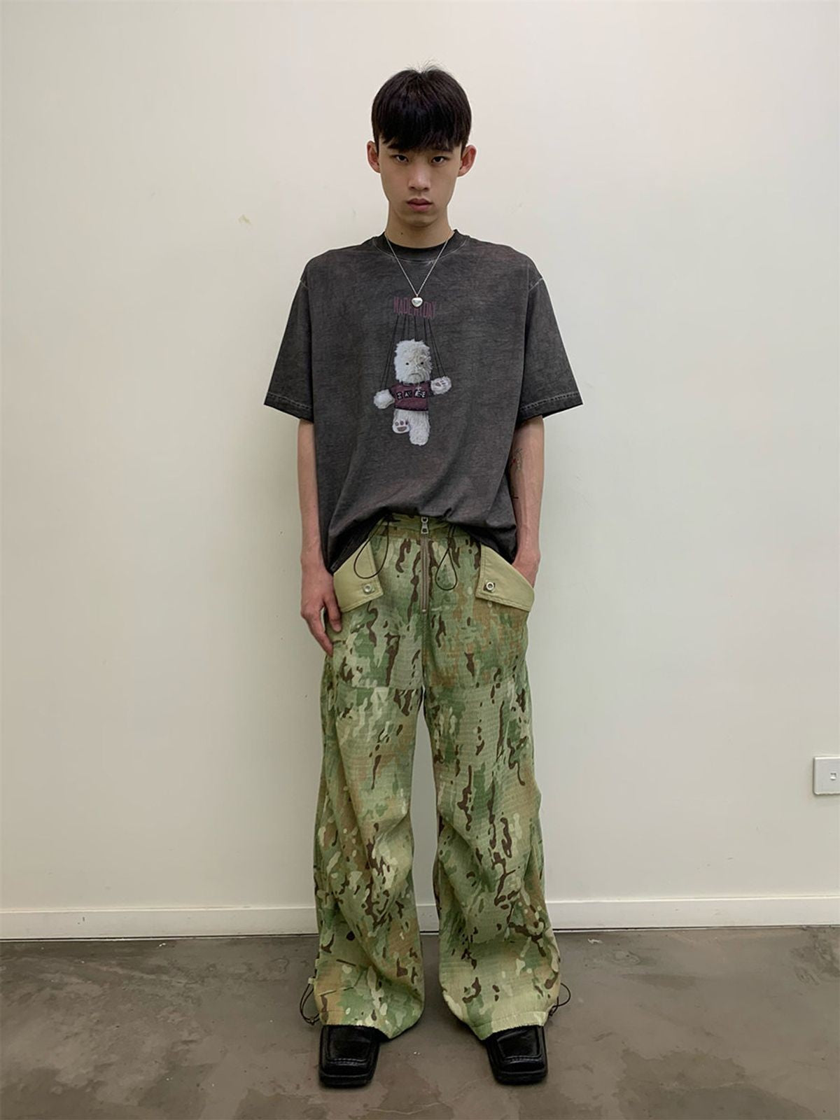 NeverSeez Garment Dyed Puppet Print Tee in Gray - On Male Model