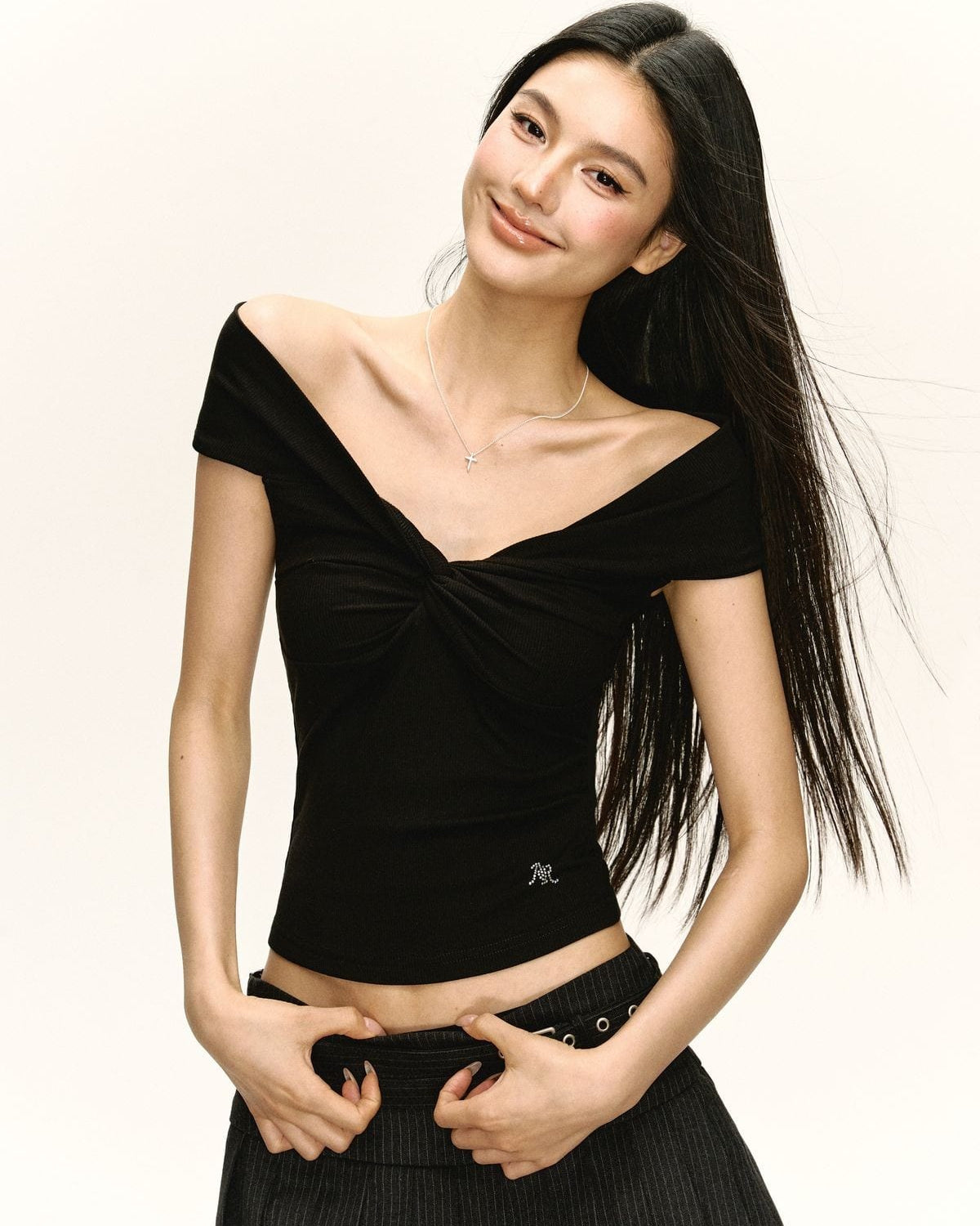 Ariseism Twisted Off Shoulder Top in Black - On Model