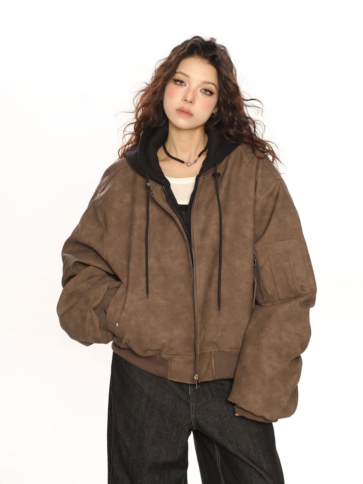 BIGGOLD STUDIO Layered Hooded Faux Leather Bomber in Brown - On Model #color_brown