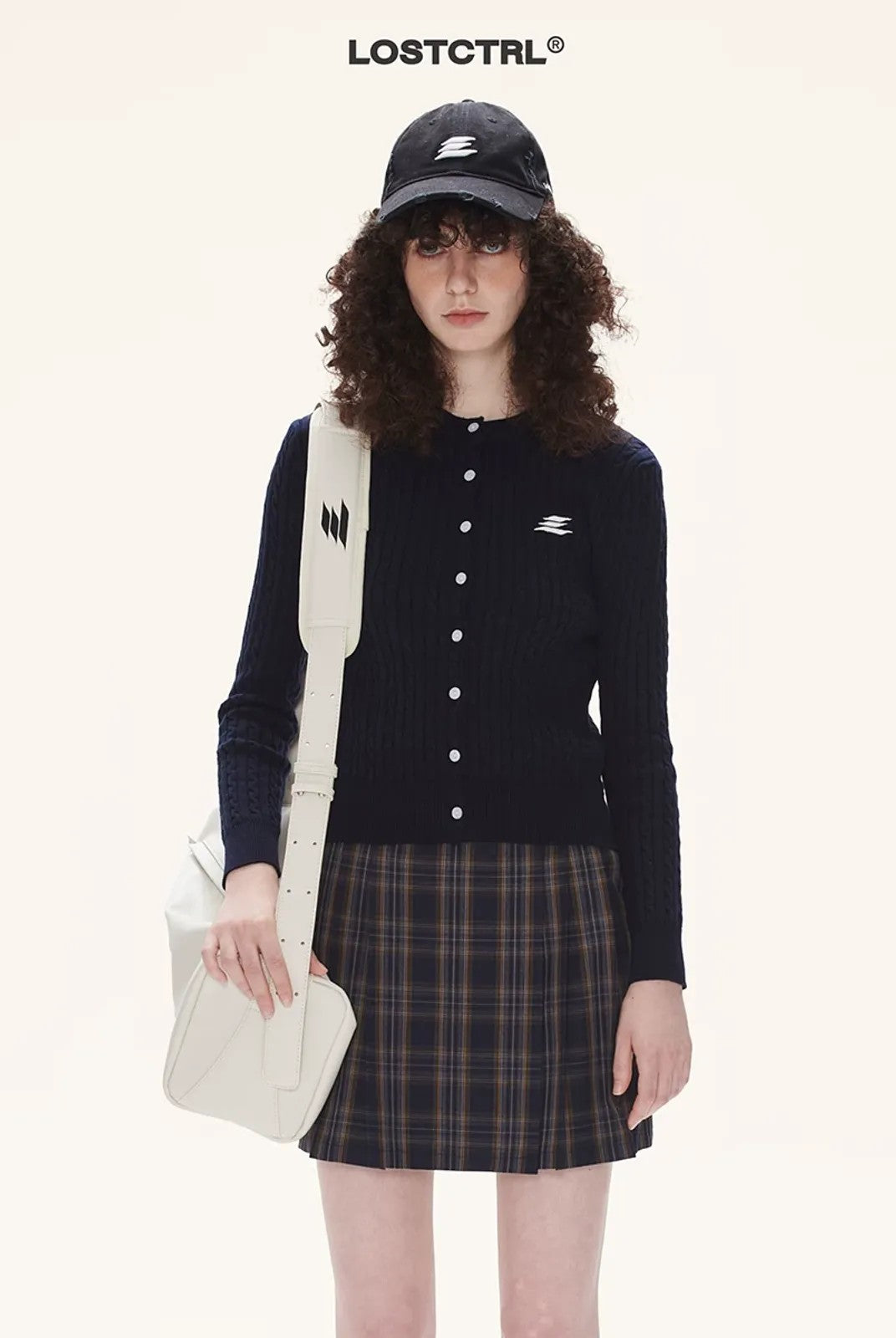 LOSTCTRL Cropped Cable Knit Cotton Cardigan in Blue - On Model