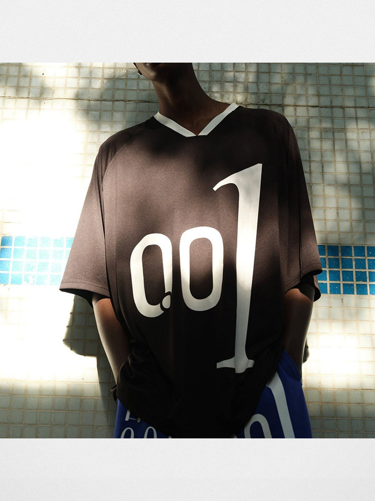 TRIANGLE PROJECT 001 Graphic V Neck Jersey Tee in Black - On Model