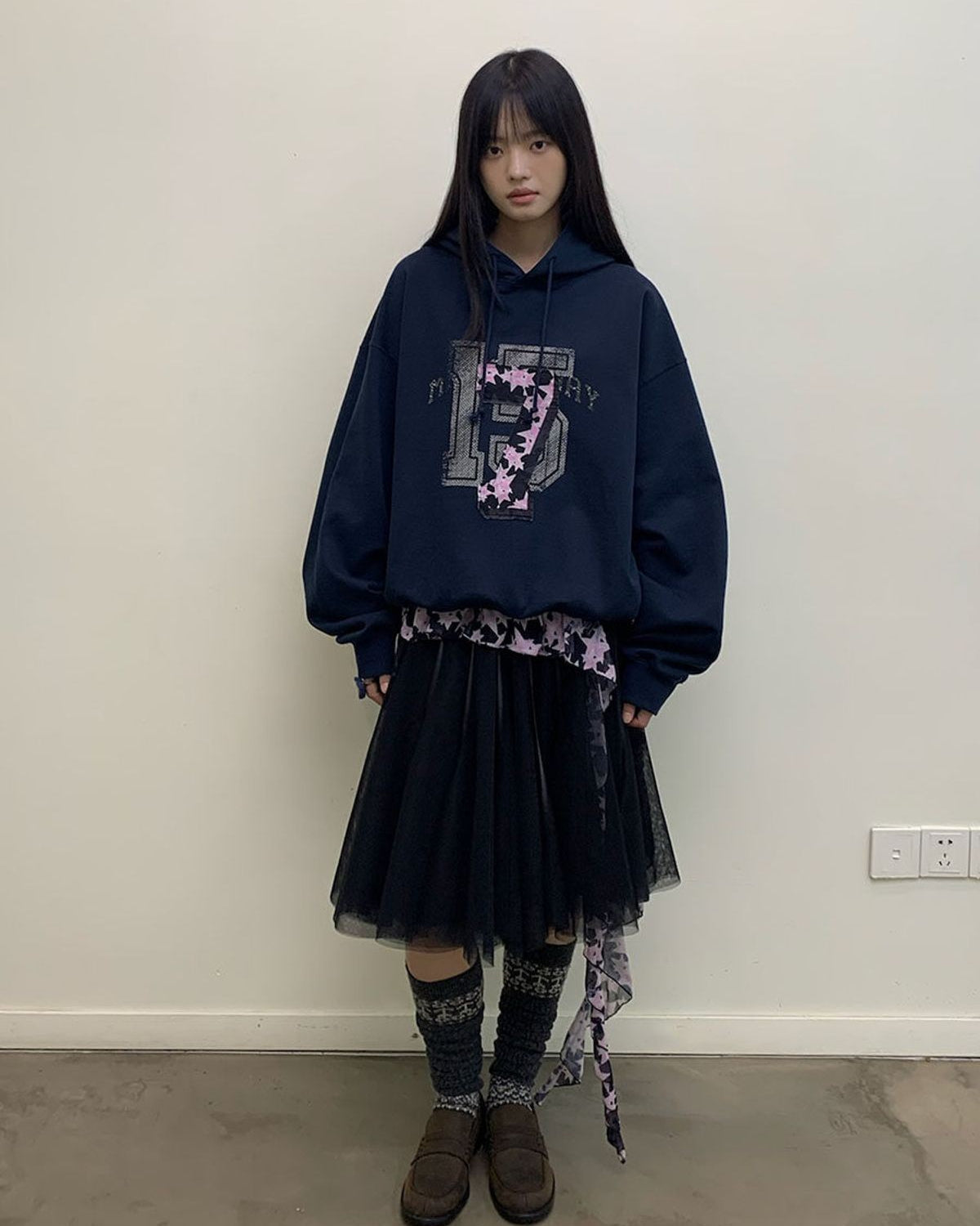 NeverSeez Layered Graphic Patch Hoodie in Navy - On Female Model