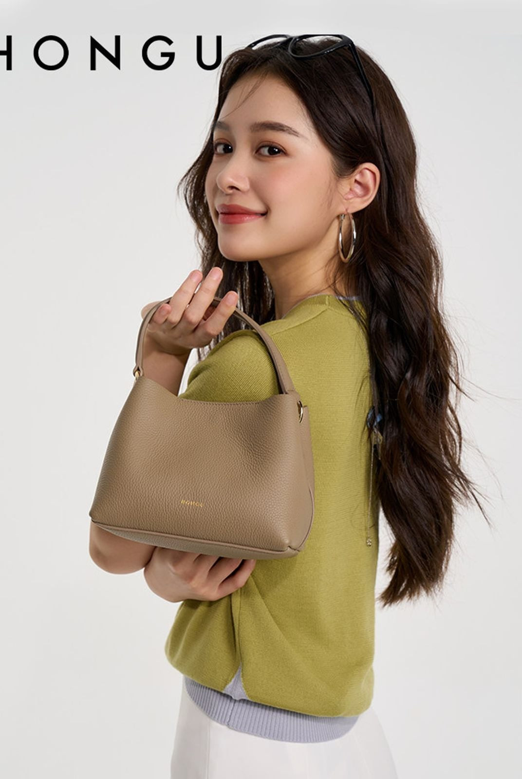 HONGU Textured Leather Top Handle Bucket Bag in Taupe - On Female Model