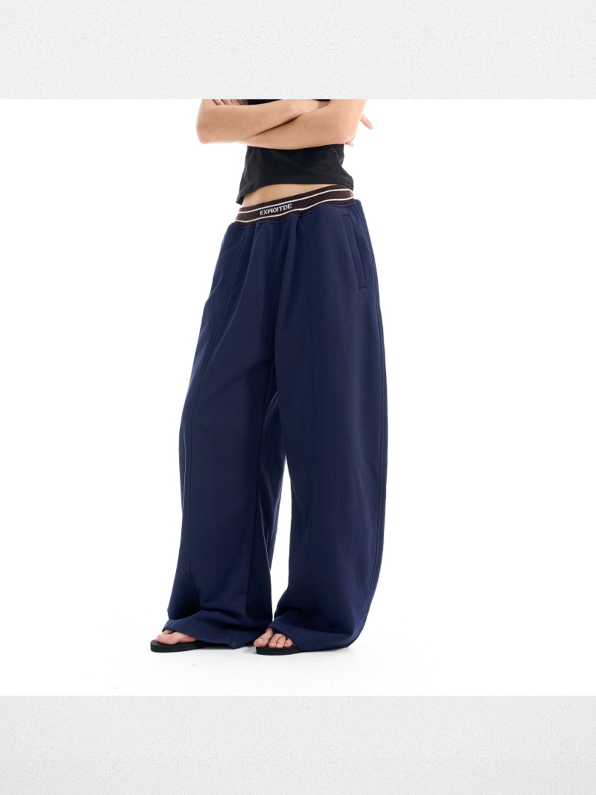 BLINDNOPLAN Curved Seam Wide Leg Sweatpants in Navy Blue - On Female Model