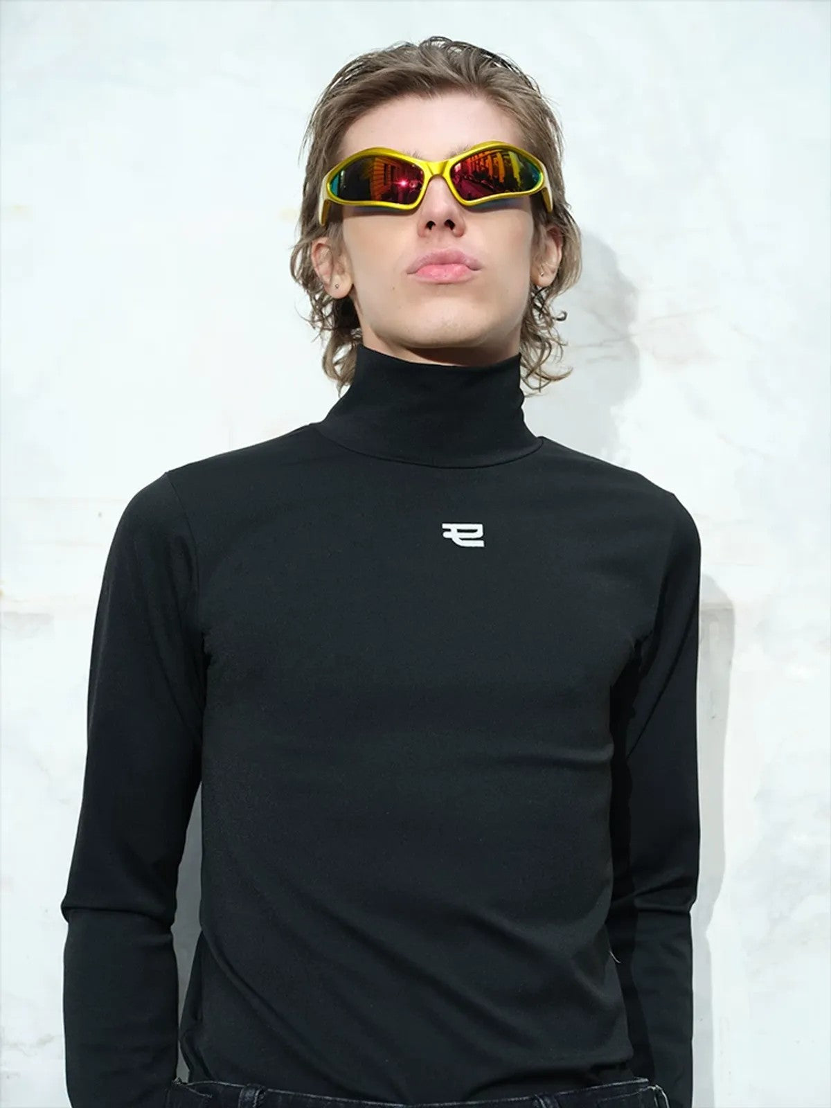 TRIANGLE PROJECT Logo High Neck Long Sleeve Top in Black - On Model