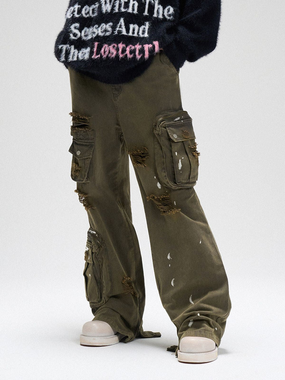 LOSTCTRL Distressed Multi Pocket Cargo Pants in Green - On Model