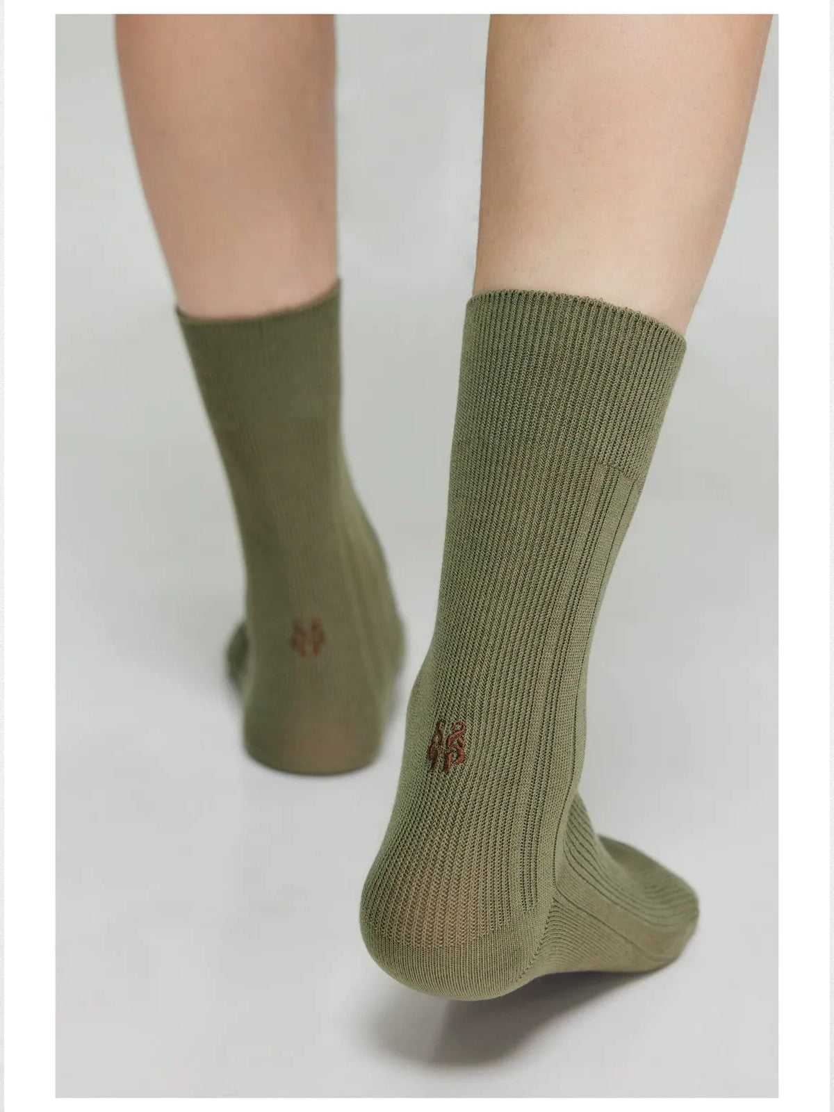 Simple Project Irregular Ribbed Crew Socks in Olive - On Model