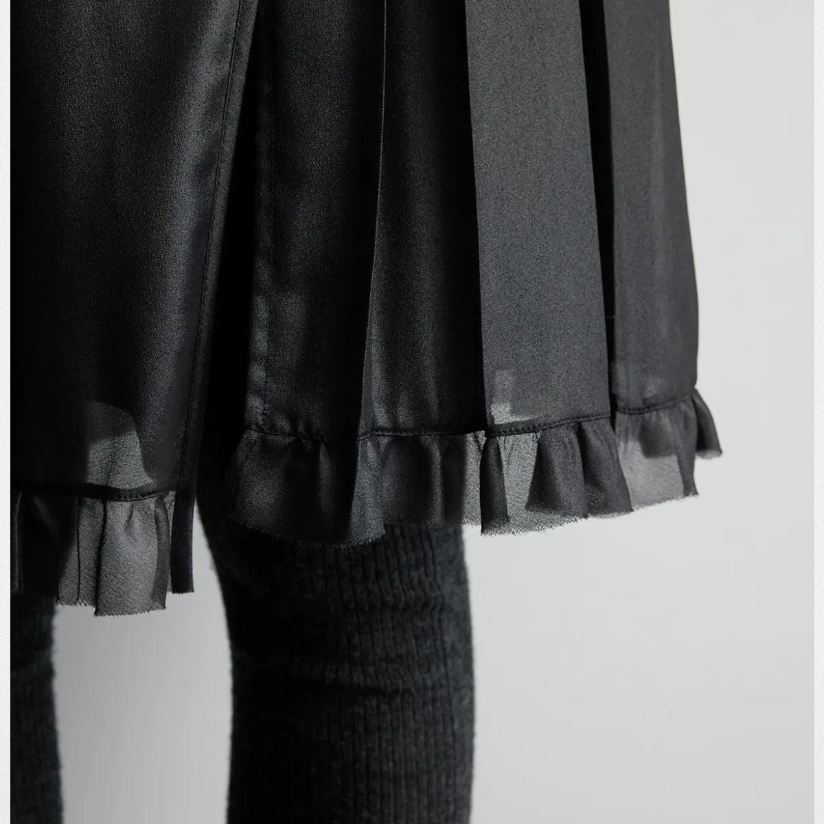 RandomPiece Irregular Pleated Ruffle Skirt in Black